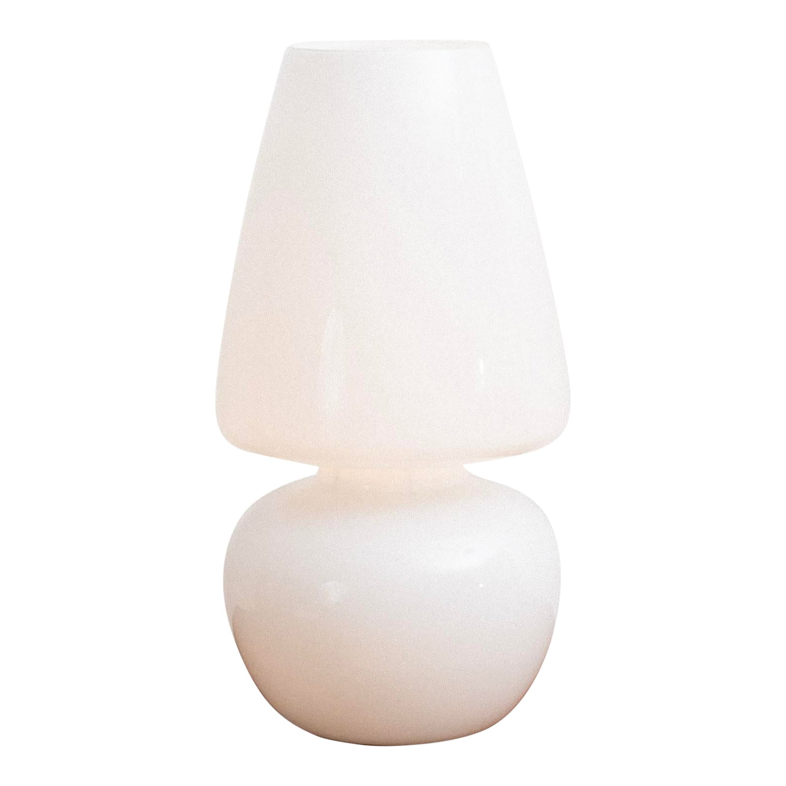 Large Italian Glass Table Lamp by VeArt: Large scale glass table lamp by VeArt, Italy. The lamp features a single-piece construction with a rounded base and flared shade form in glossy opaque glass. When illuminated, the glass produces a