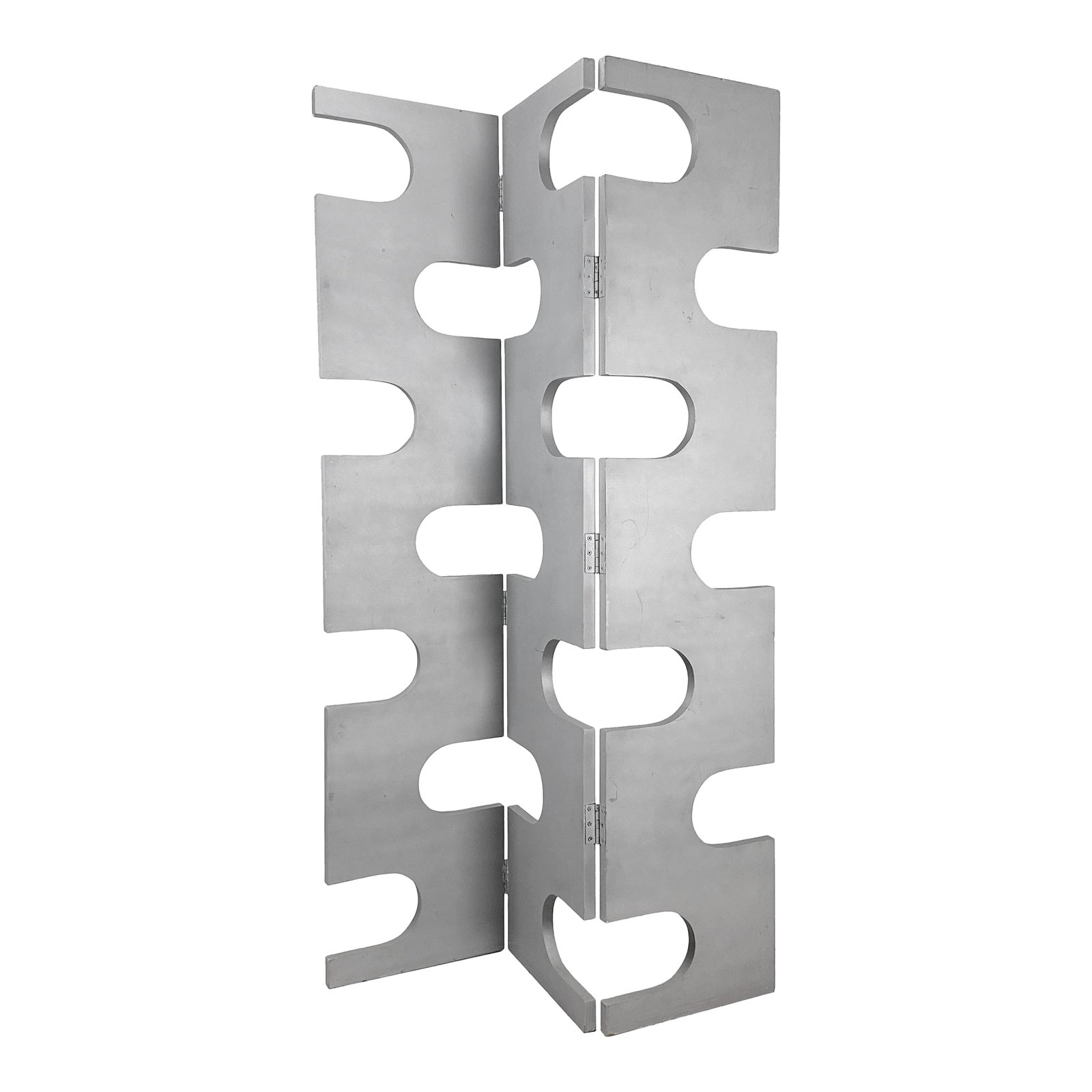 Vintage 1990s Modernist Wood Room Divider With Silver Finish & Geometric Cutouts - Eileen Gray Style: Vintage 1990s three panel folding room divider made from solid MDF with a silver painted finish. Each panel has a repeating grid of circular cutouts arranged in a geometric layout. Panels are