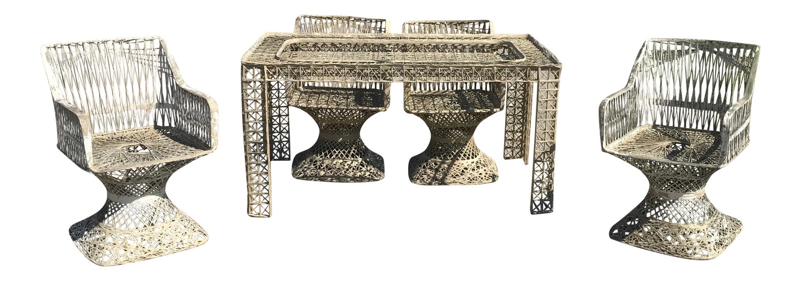 Mid-Century Modern Russell Woodard Spun Fiberglass Patio Set: This beautiful vintage modern patio set includes four chairs and a rectangular dining table. Unique design made of woven fiberglass with tulip shaped bases. Extremely comfortable dining chairs with a 