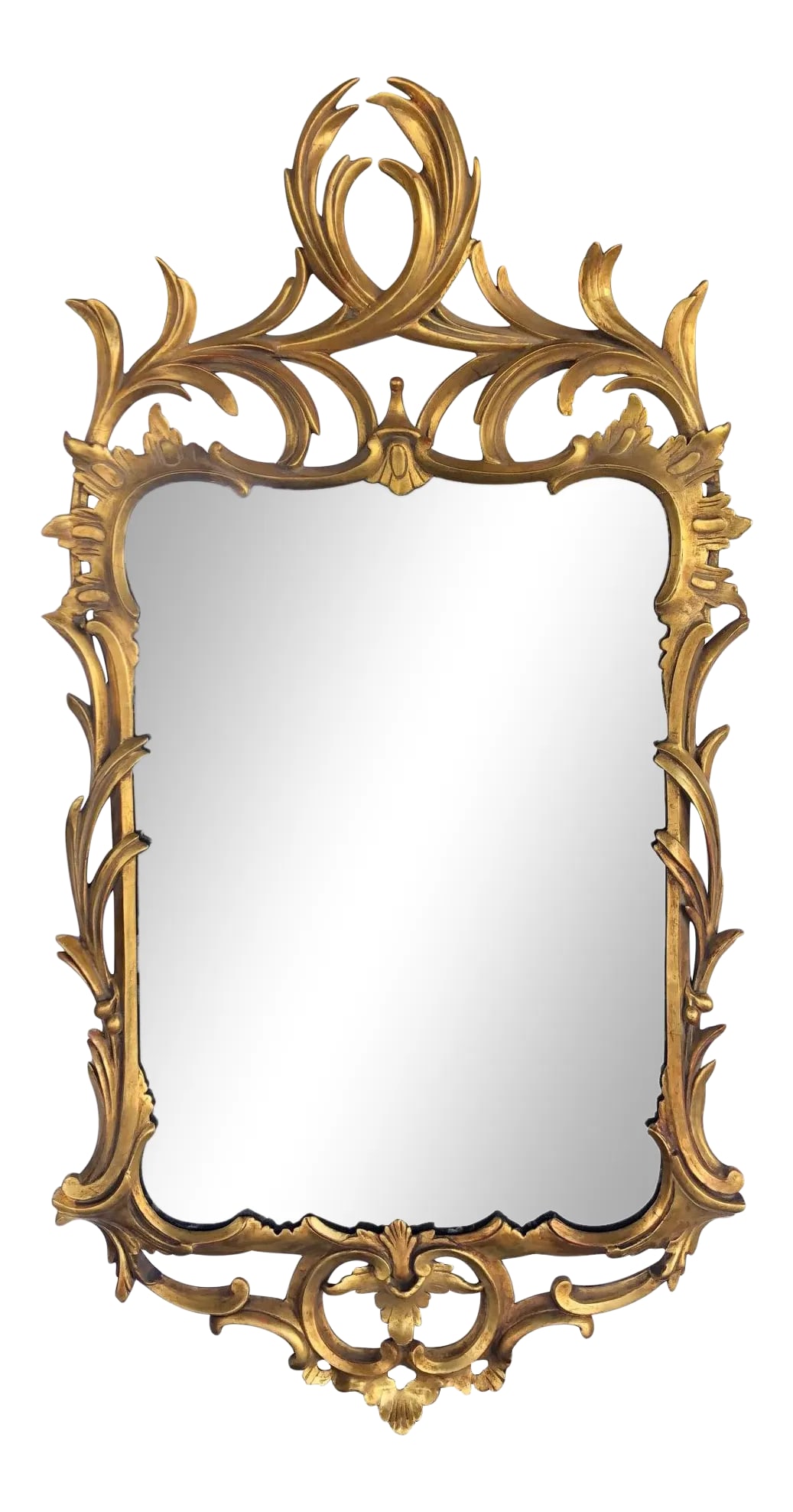 Late 19th Century Hand-Carved Continental Rococo Revival Foliate Giltwood Mirror: A mirror with lively interlacing foliate crest above a rectangular-form frame adorned with rocaille carving at the shoulder above meandering foliate vines Condition: Alterations: Restored Imperfection