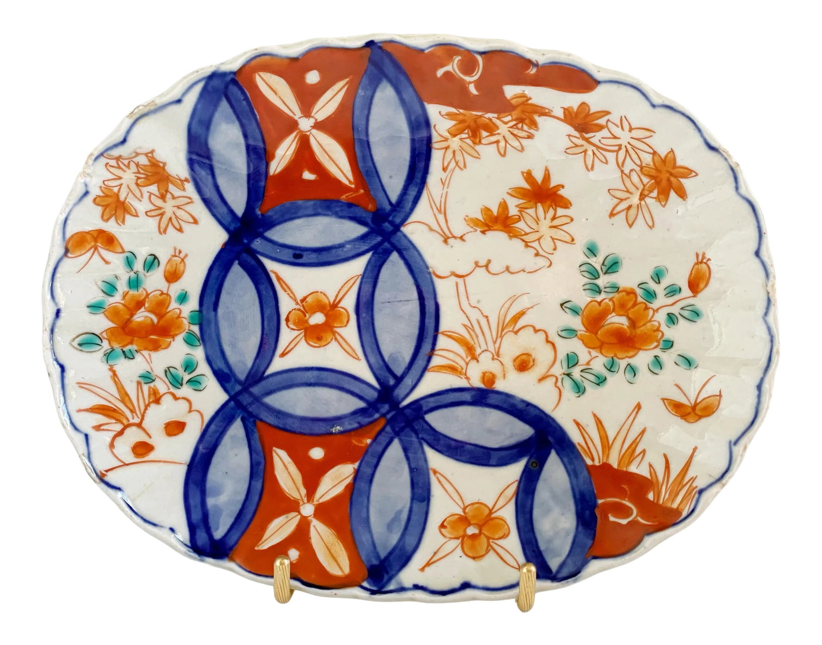 Antique Mid 19th Early Meiji Period Japanese Imari Oval Dish Charger Scalloped Rim: Antique ca 1840 early Meiji Period Japanese Imari charger dish. Oval shape with a scalloped border, wonderful cobalt blue underglaze decorations alternating in iron red enamels. Rare and collectible