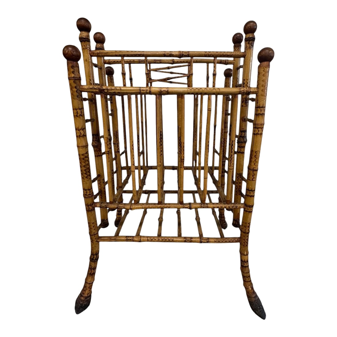 Victorian Aesthetic Movement Faux Bamboo Magazine Stand: Beautifully turned and hand-decorated with warm patina and elegant Japonesque lines. A refined, functional accent for a curated interior. A faux bamboo standing rack, made of wood that has been