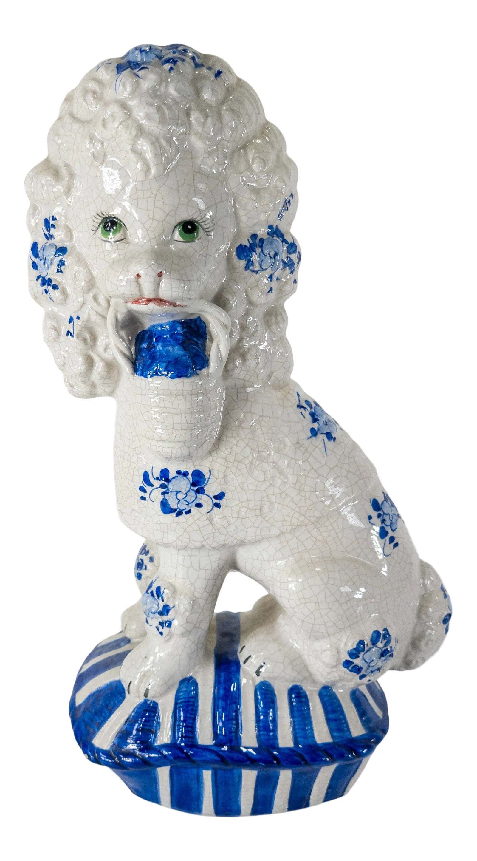 Italian Mid Century Blue and White Crackle Poodle Dog: We are selling this charming Mid-century Italian pottery dog. This dark blue and and crackled white pottery is modeled in the form of a seated poodle with a basket in its mouth. The figure is almost