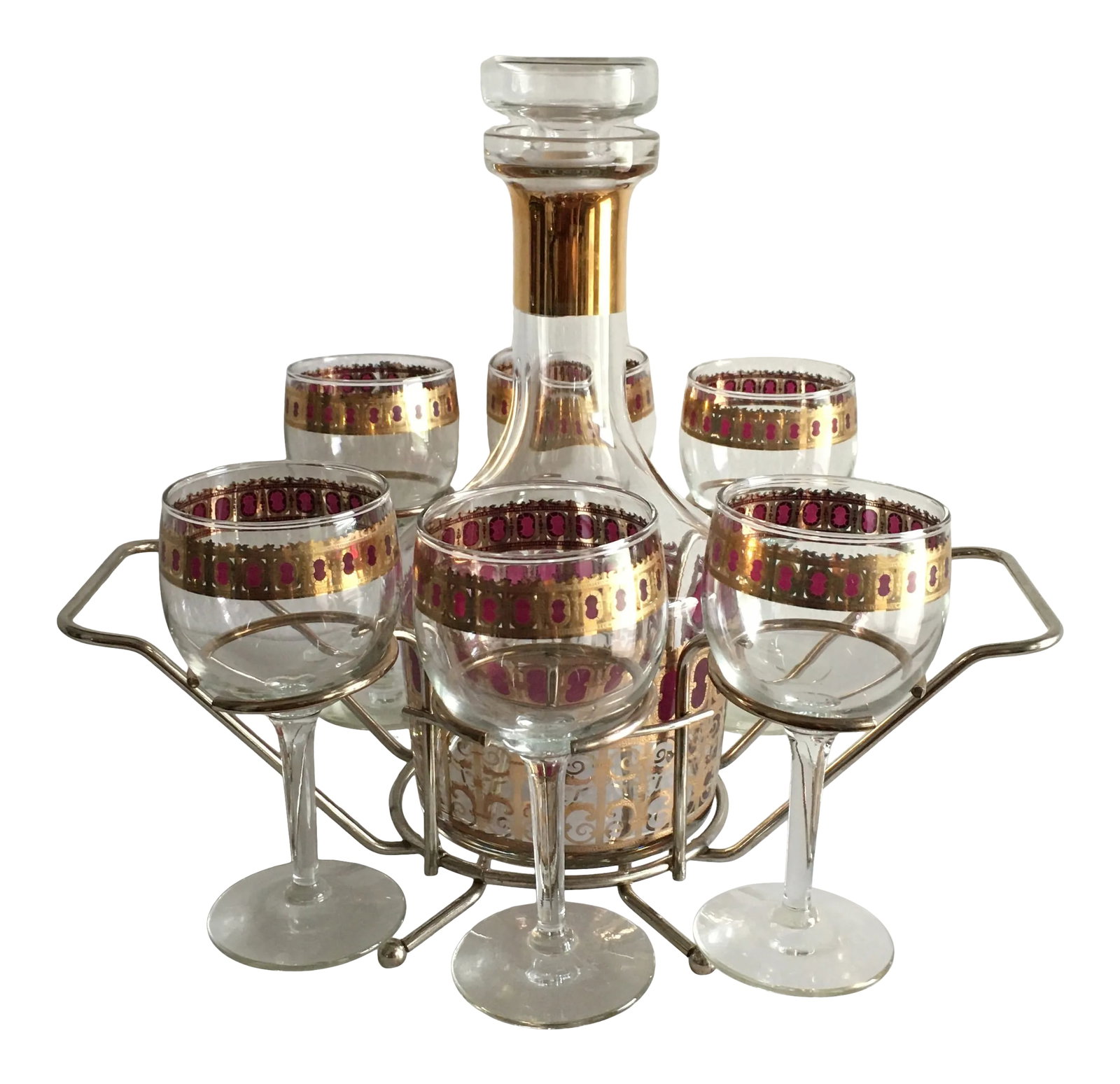 Vintage Culver Wine Glasses & Decanter With Holder- 7 Pieces: Culver wine glasses & decanter with carrier. Red Moorish design with 22K gold. Too pretty to keep in a cabinet. Wine glasses 5.75"H Decanter & lid 10.5"H Condition: Alterations: Original Condition