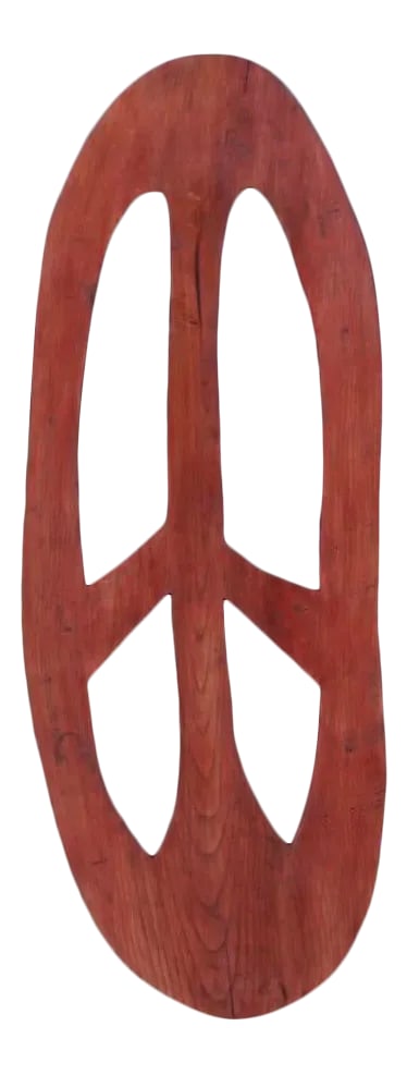 1990's Large Sculptural Handcrafted Wood Peace Sign: Large sculptural free form wall art. Solid ash with mahogany finish. This 1990's anamorphic representation of a peace sign is a bold, and current visual statement for today's world. Condition: