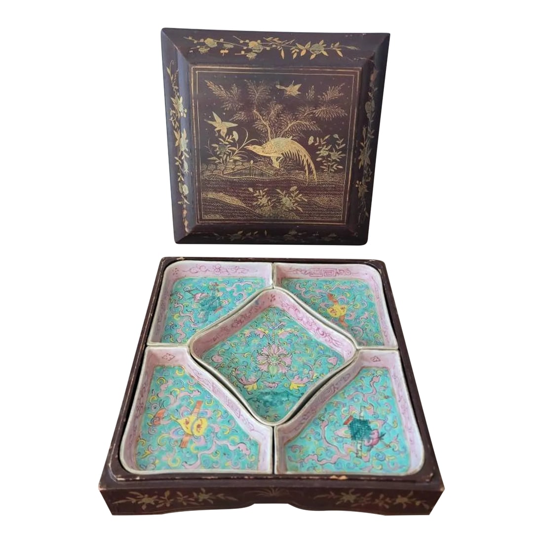 Antique Chinese Famille Rose Porcelain Sweetmeat Dishes: An antique Qing Dynasty Chinese sweetmeat (confectionery or sweet food) box, dating to the early 20th century, featuring a lacquered and parcel gilt painted box decorated in a stylized naturalistic sc