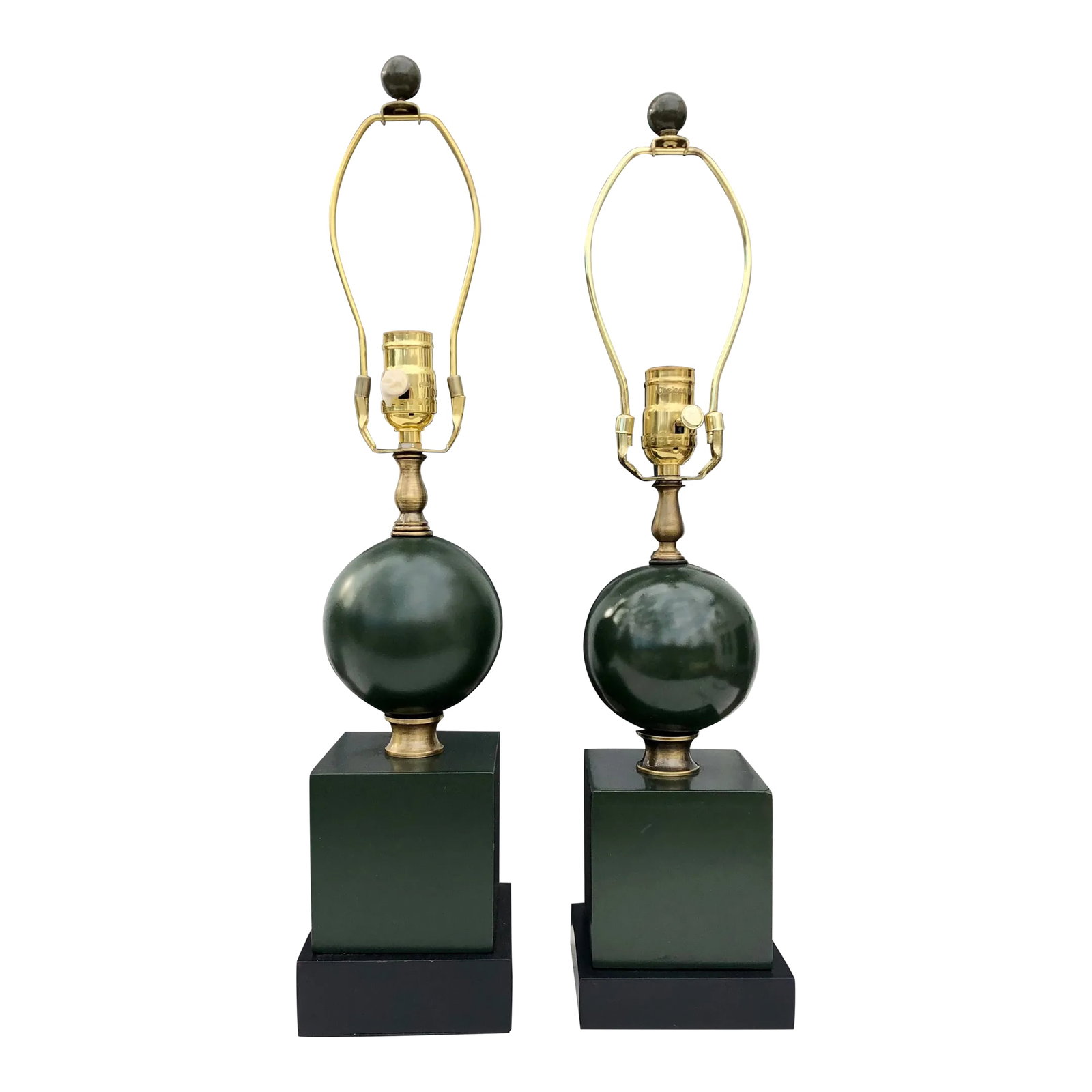 Chelsea House Early 21st Century Art Deco Brass and Wood Lamps - Set of 2: Near pair of Chelsea House table lamps with solid brass fittings and satin lacquered forest green wood art deco bodies in sphere and cube form. Lamps measure 22.25-23" tall, and have 5" square bases. 