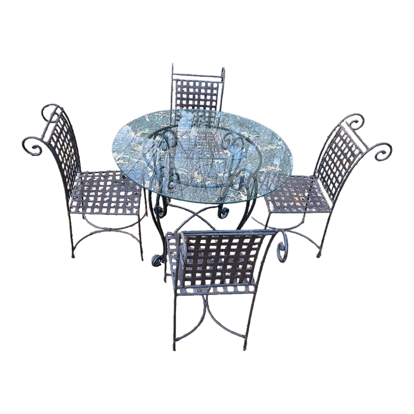 Late 20th Century Round Wrought Iron Glass Top Table With 4 Chairs: This table and chair set is in fantastic condition. It is sturdy and well-made. It features lattice back chairs and a four-leg round pedestal design for the table. Table Dimensions: 42" Diameter