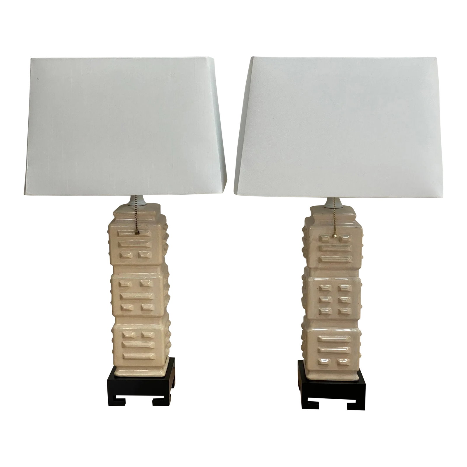 Hollywood Regency Style Ceramic Table Lamps - a Pair: A pair of Hollywood Regency Style hand crafted ceramic lamps Asian influenced motifs. Shades included. The dimensions of the shade are: Length of bottom of the shade measures 15" Length of top of the 