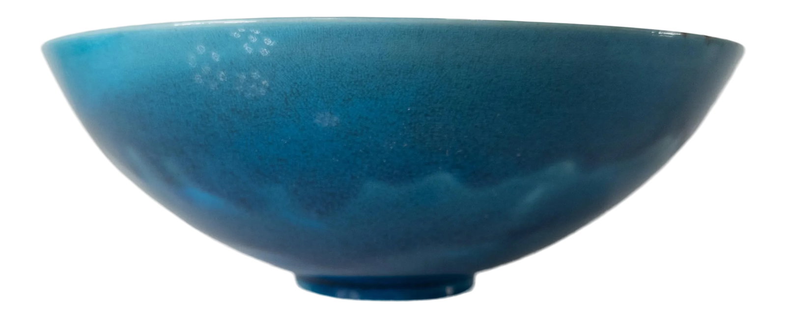 Danish Modern Bing & Grondahl Turquoise Blue Bowl: We are offering this unusual piece of Bing and Grondahl porcelain. This bowl is glazed with a bright blue turquoise glaze and simple floral decoration in the bottom of the bowl and drippy exterior