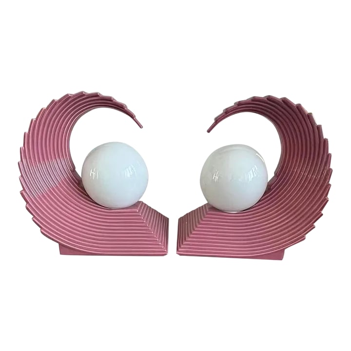 1980s Art Deco Revival Pink Ceramic Wave Lamps - a Pair: Art Deco Revival Pink Ceramic Wave Lamps - a Pair Condition: Alterations: Original Condition Unaltered Imperfections: Some Imperfections Condition Notes: Both lamps in working condition. One lamp is