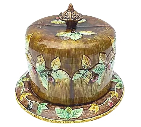 Antique Majolica Covered Dish: Antique; 19th century, majolica covered cake dish with lid and bottom plate. Berries and vine motif and mottled glazing. Indistinguishable maker's mark on the underside. Lid cover: 8.5"Dia x 8.5"H. Pl