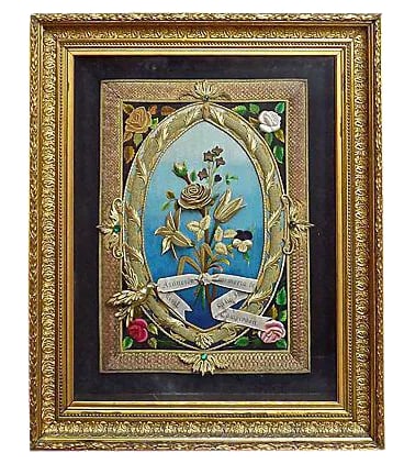 Vintage Spanish Commemorative Embroidered Plaque: Vintage; 1910-1950, Spanish, commemorative, embroidered, floral, wall plaque in a giltwood shadow box. Floral elements and design are finely embroidered with metallic materials in high relief. Back