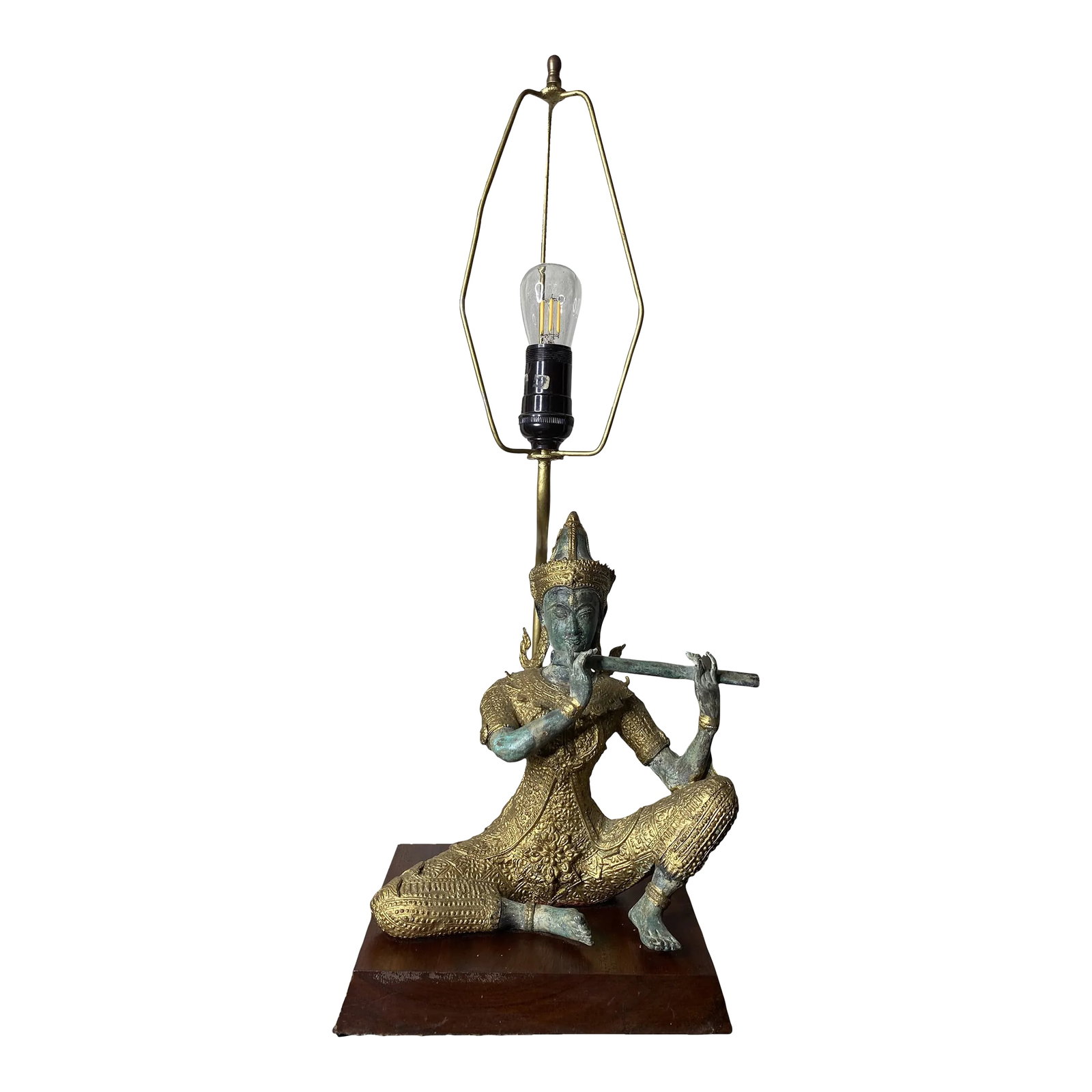 Vintage Asian James Mont Style Gilt Metal Asian Deity Lamp.: Lovely bronze-like metal seated Asian sculpture (likely Tibetan) lamp. The figure is seated, playing a flute, and wearing an elaborate outfit and hat all highlighted with gilt paint. Figure is