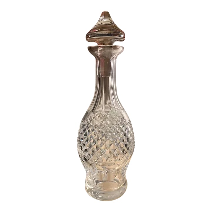 Circa 1970 Waterford Colleen Crystal Decanter: Vintage waterford crystal decanter with elegant Moorish inspired design, features a stylized genie bottle with pointed stopper. Handcrafted and mouth-blown lead crystal with brilliant prismatic