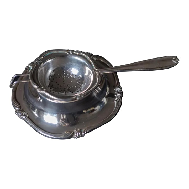 1960's Peruvian Sterling Silver Tea Strainer and Bowl Nouveau Pattern- 2 Pieces: One of the best silversmiths in Peru is the Camusso brand, and in the midcentury no one created more stunning silver objects for house and home. This estate piece is a sterling silver set consisting