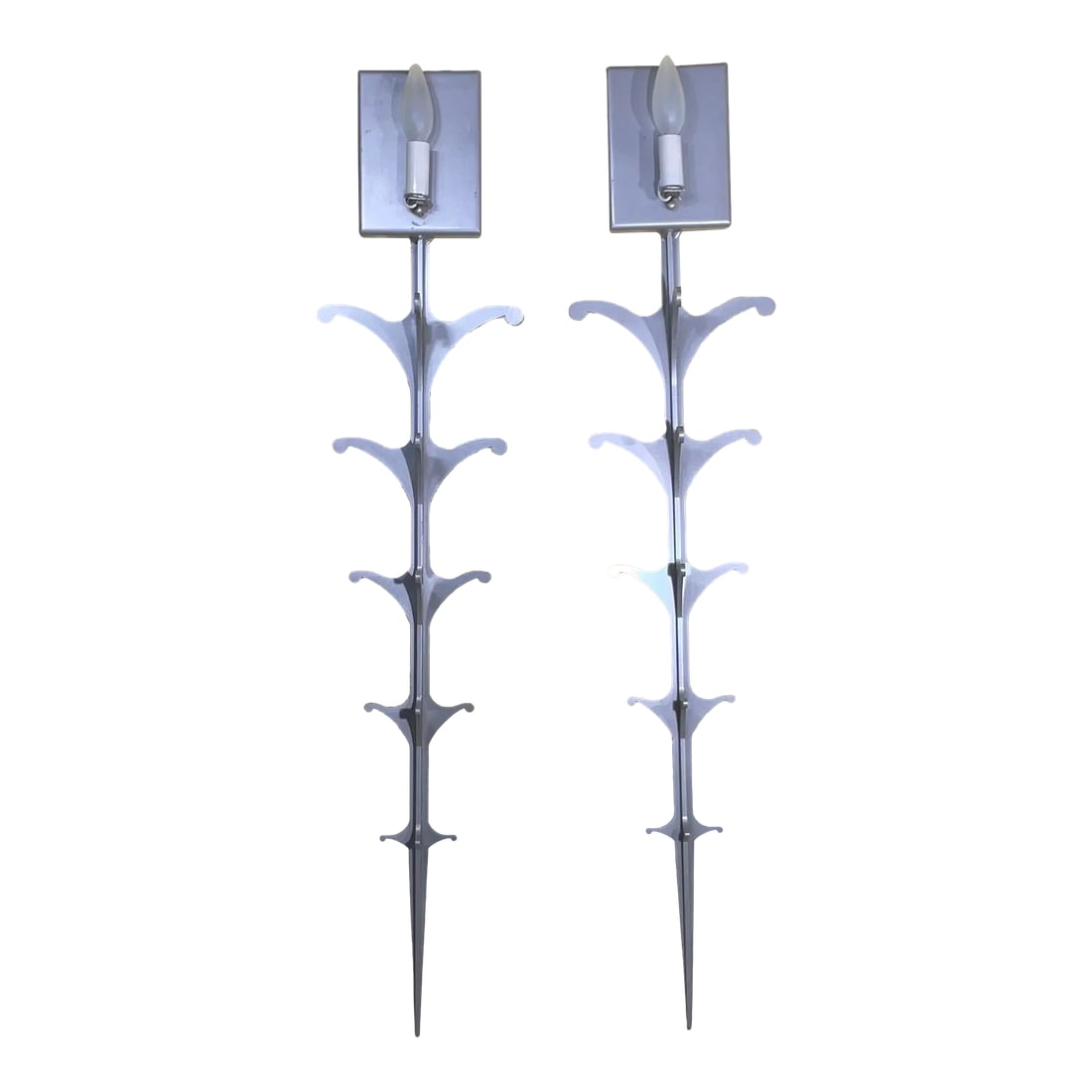 Pair of Midcentury Steel Wall Scones: Elegant pair of wall sconces made of solid steel with one 60/watt light each, great clean look Vertically. UL approve up to US code. Condition: Alterations: Original Condition Unaltered Imperfections:
