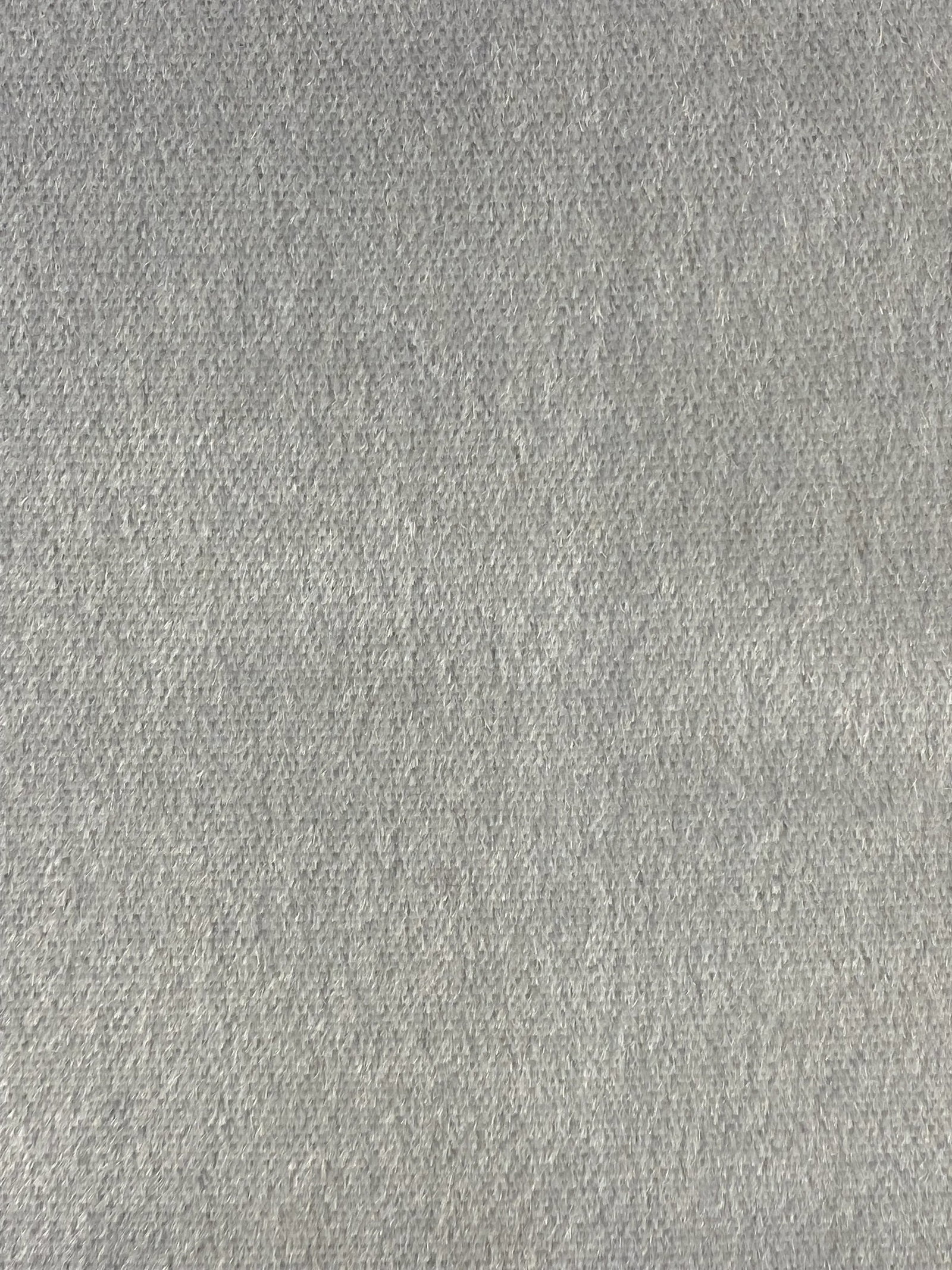 Yoma's "Vendome" Plush Mohair Fabric - 14.5 Yards: A luxe mohair faced upholstery velvet in a chic light grey colorway called "glace". The upholstery weight plush exceeds 50,000 wyzenbeek double rubs. Passes CAL-117, NFPA 260. BRAND: YOMA DESIGN