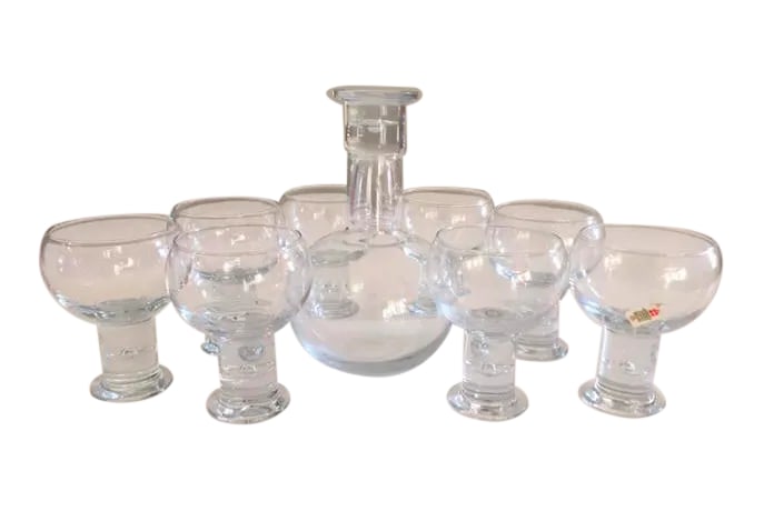 Holmegaard Danish Whisky Glasses & Decanter-Set of 8: Fabulous set of eight Holmegaard whisky glasses and decanter. The glass is crystal clear and a cool icy tone. Each glass features a Saturn design in the stem as well as in the stopper of the