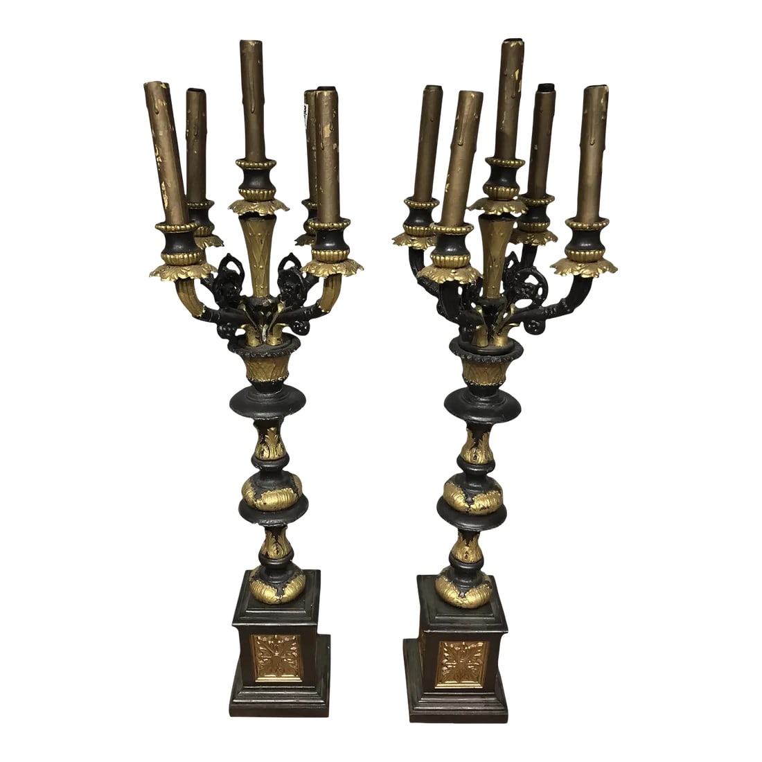 Early 20th Century French Five Light Candelabra Table Lamps - a Pair: A magnificent pair of monumental French Napoleon III Second Empire style five light candelabra from the early 20th century. Having ebonized partial gilt foliate accented elaborately shaped iron column