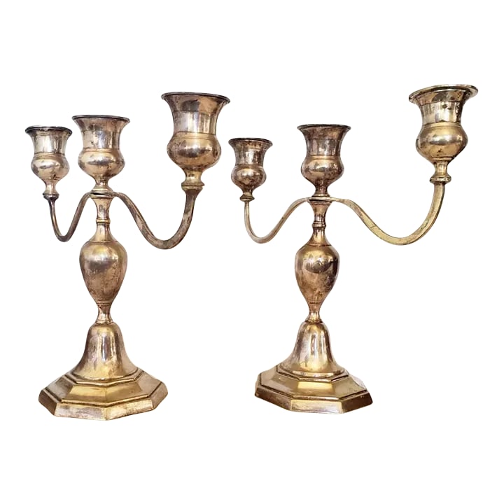 Mid 20th Century Silverplated Candelabras Pair: Lovely pair of vintage silverplalted candelabras. Classical decor that looks lovely year round! The candelabras are in very good condition with moderate age patina as shown in photos. The six arms
