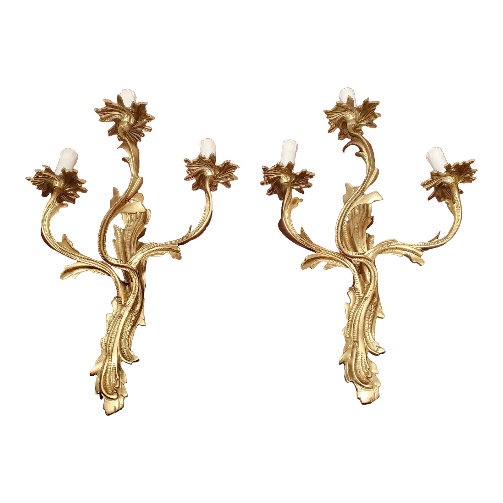 Vintage Hollywood Regency Mid-Century Louis XV Style Sconces - a Pair: A very decorative pair of vintage mid century Hollywood Regency glamour gilt gold sconces. Inspired by the Louis XV decorative objects of the 18th century France with an organic botanical design
