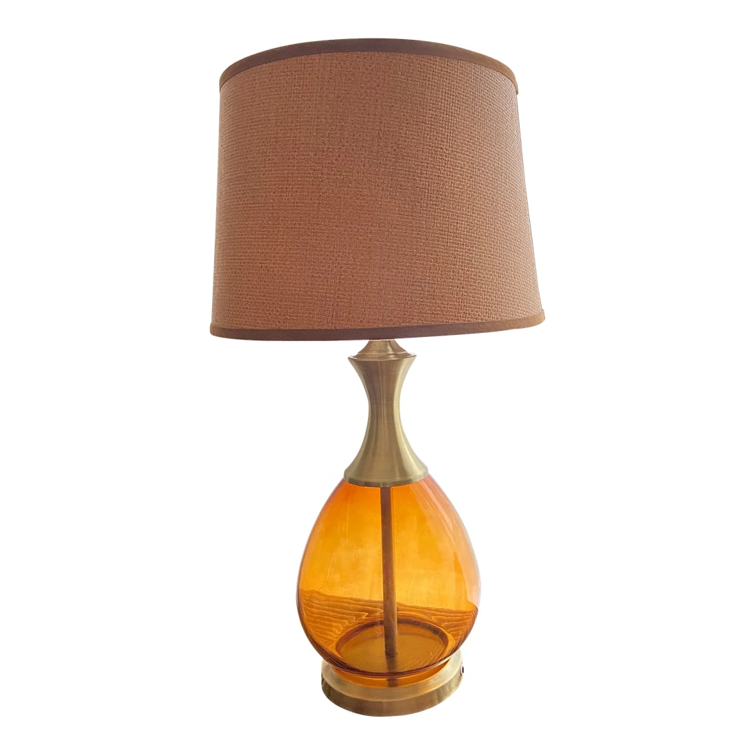 Vintage Amber Glass Lamp: Vintage amber glass lamp of the Hollywood regency style features a gorgeous night light in the rich amber glass bass with satin antique brass base and graceful neck. Lamp shade is made by finest
