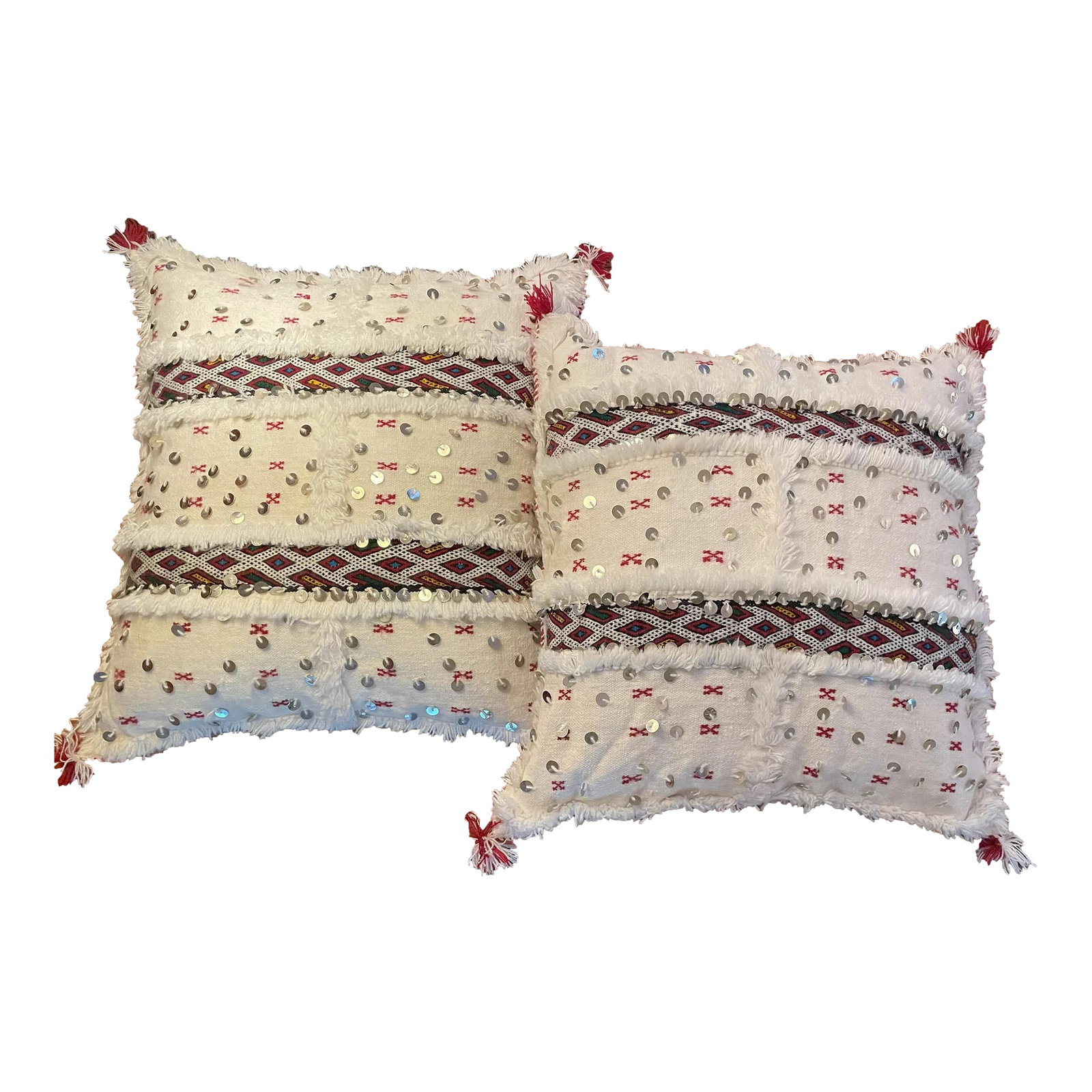 Set of 2 Large Moroccan Pillows: Vintage Moroccan white background handwoven pillows. White with red accents and trip. Ornate fringed red patterned stripes and sequined embellishment. No zipper. Condition: Imperfections: No
