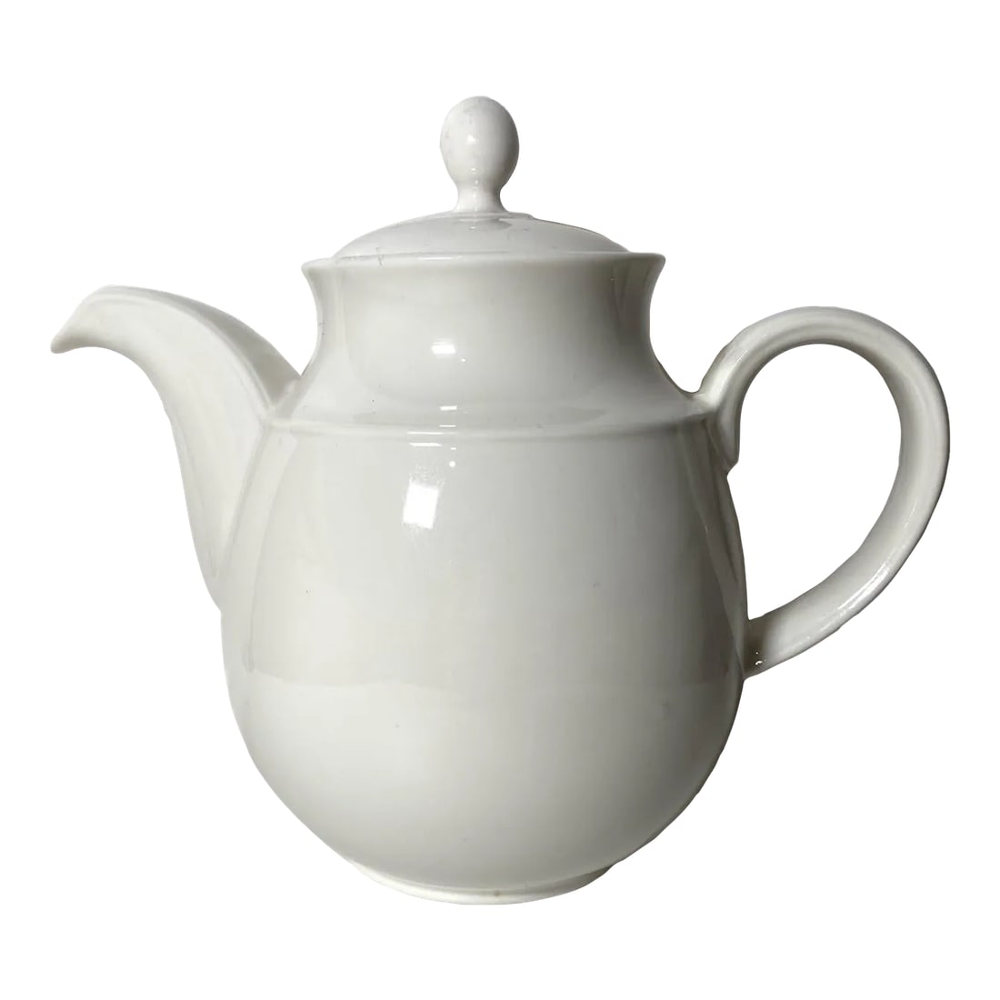 1990s Royal Doulton Silhouette Expressions Teapot & Lid: The ROYAL DOULTON Silhouette (Expressions) Teapot & Lid is a sleek and minimalist piece from the Expressions line. It is characterized by an all-white design, lacking any trim, offering a bright and