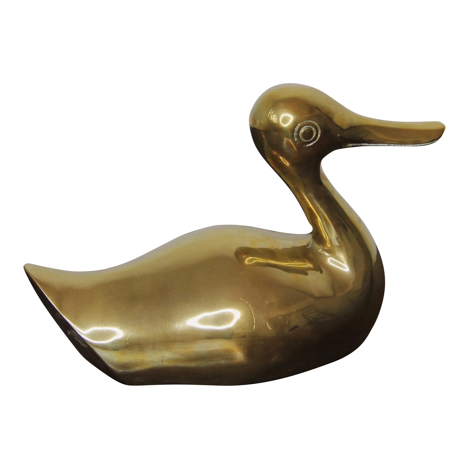 Mid-Century Modern Brass Duck: This beautiful mid-century modern brass duck is the perfect addition to any interior decor. Crafted from solid brass, this eye-catching piece will add a unique touch to your home. Condition: