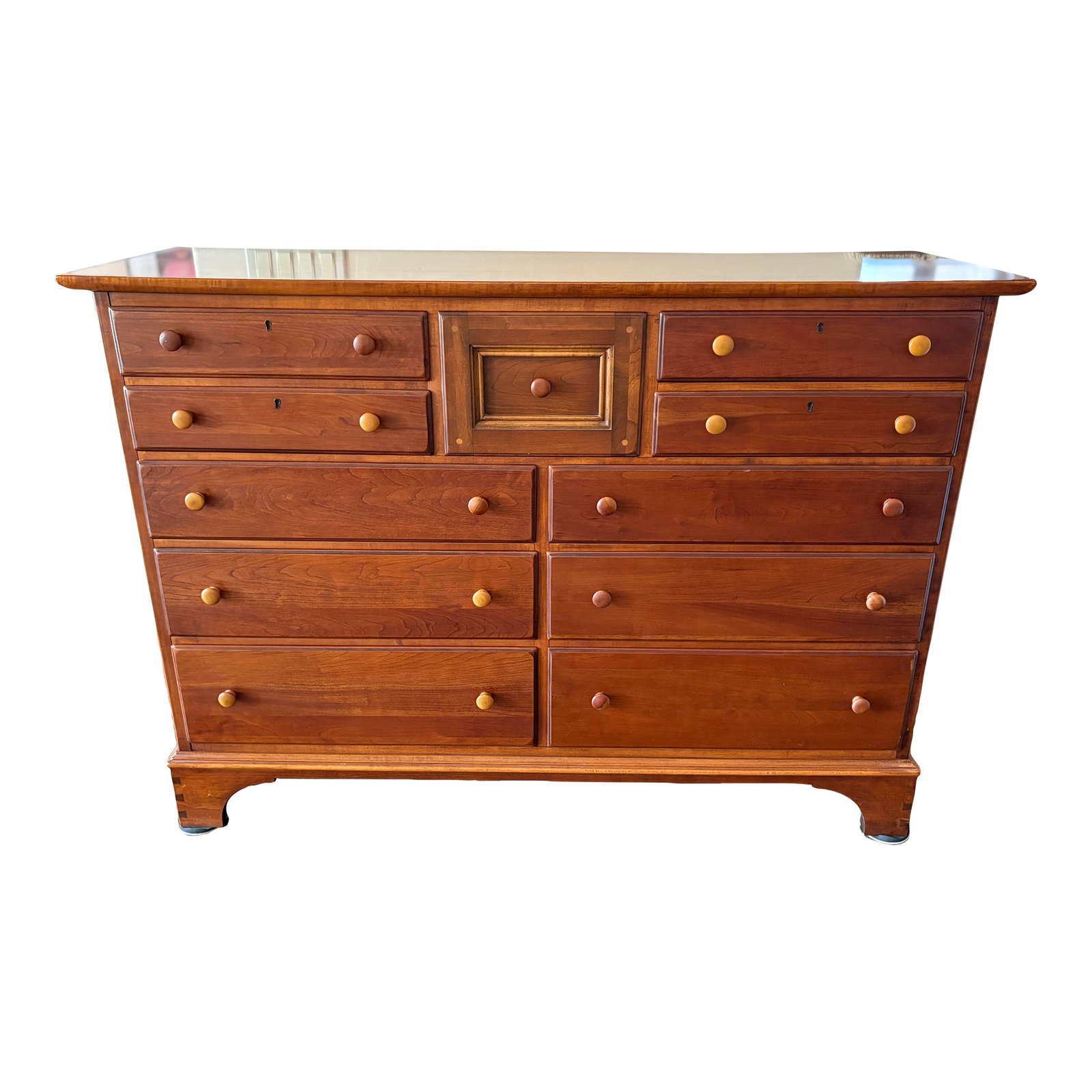 1990s Lexington Solid Cherry Shaker Style Large 11 Drawer Dresser: Lexington Cherry Shaker style 11 drawer chest of drawers / dresser. Six standard size drawers, 4 thin drawers and one very deep center drawer. A striking and unique design. Cedar lined drawer.
