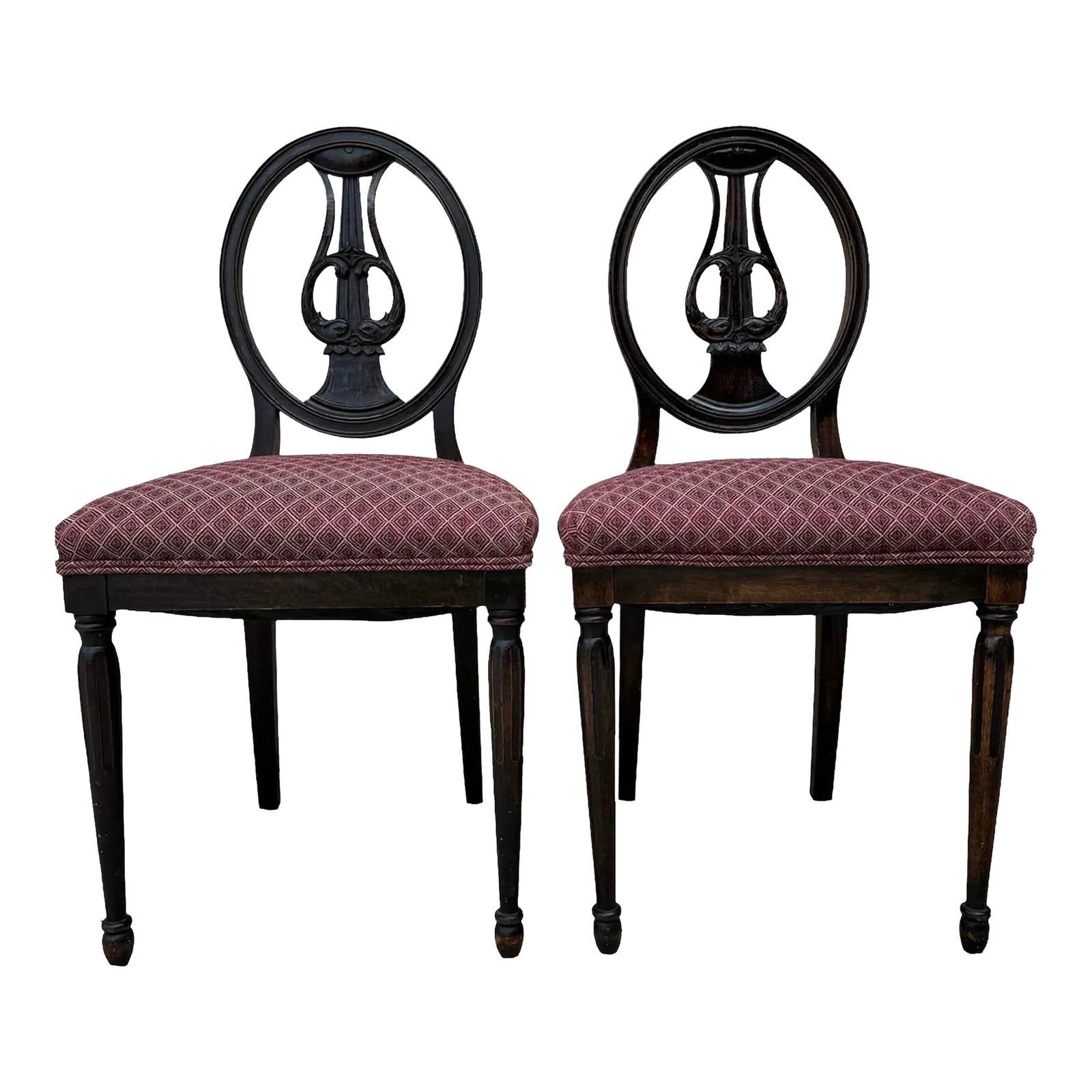 1930s Music Chairs With Koi Dolphin Carvings and Vintage Fabric- Set of 2: Introducing a pair of exquisite antique music/violin chairs that beautifully merge artistry and functionality. These chairs are adorned with intricate carvings of koi and dolphin details, showcasing