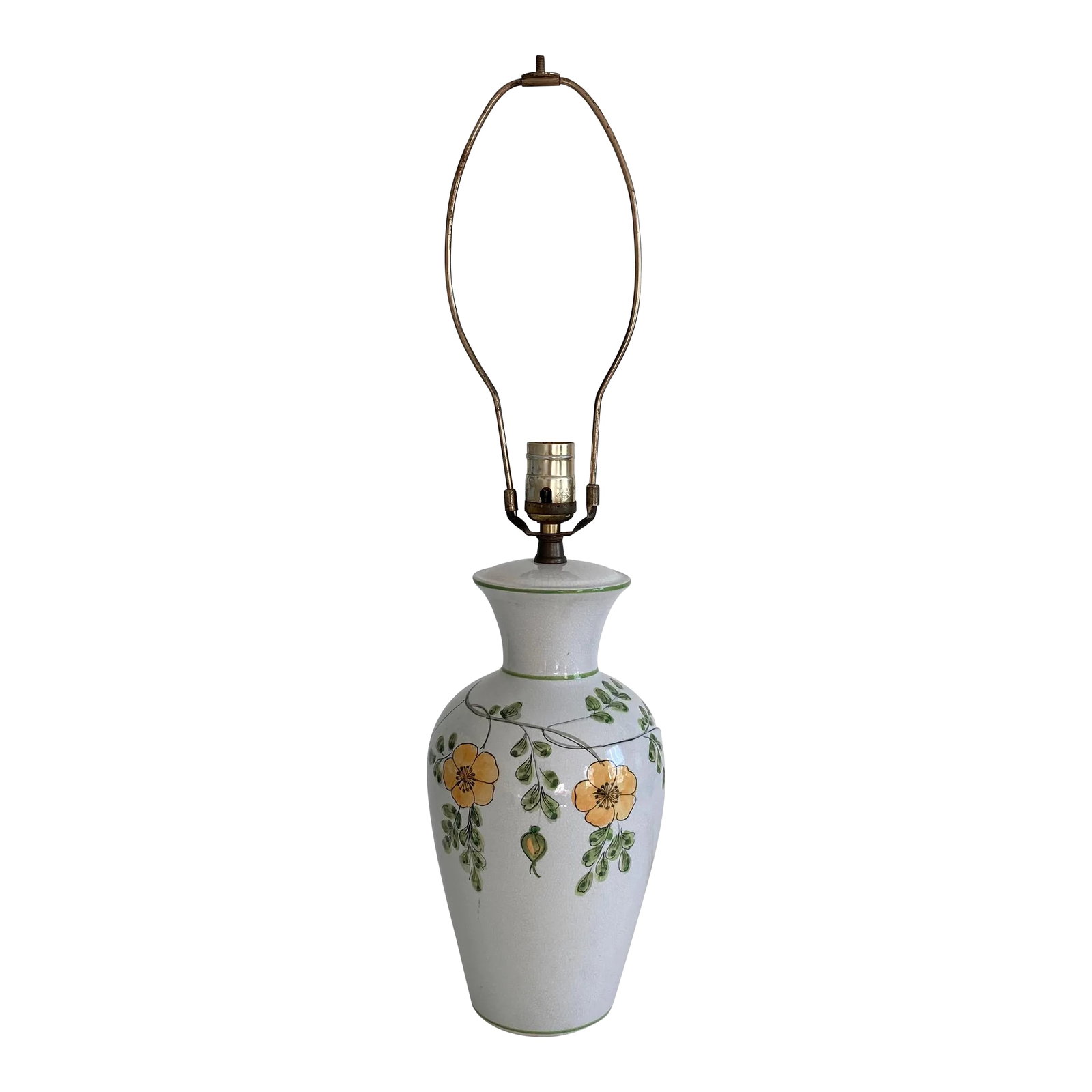 Vintage Ceramic Floral Pattern Yellow Green Colors Crackle Glaze Finish Table Lamp, Made in Italy Ci: A Made in Italy, ceramic table lamp featuring a floral pattern in yellow and green on a white/ off-white crackle glaze background. Lamp has been professionally rewired and includes a new finial in a