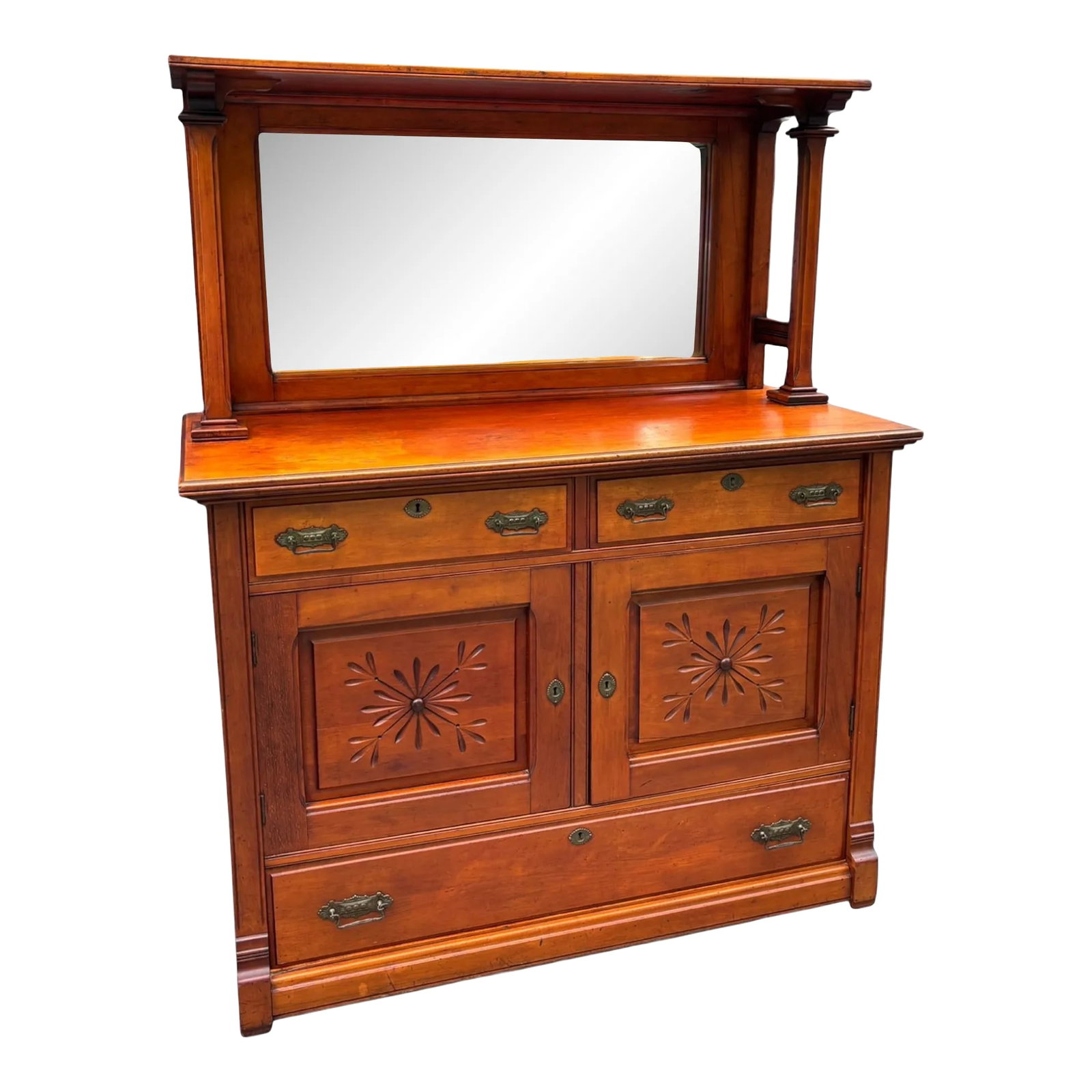 Antique Arts and Crafts Style Mirror Back Server: Expertly crafted and stunning, this Antique Arts & Crafts Style Mirror Back Server from the late 19th century boasts beautifully carved panels, original brass pulls, and dovetail joinery. With two