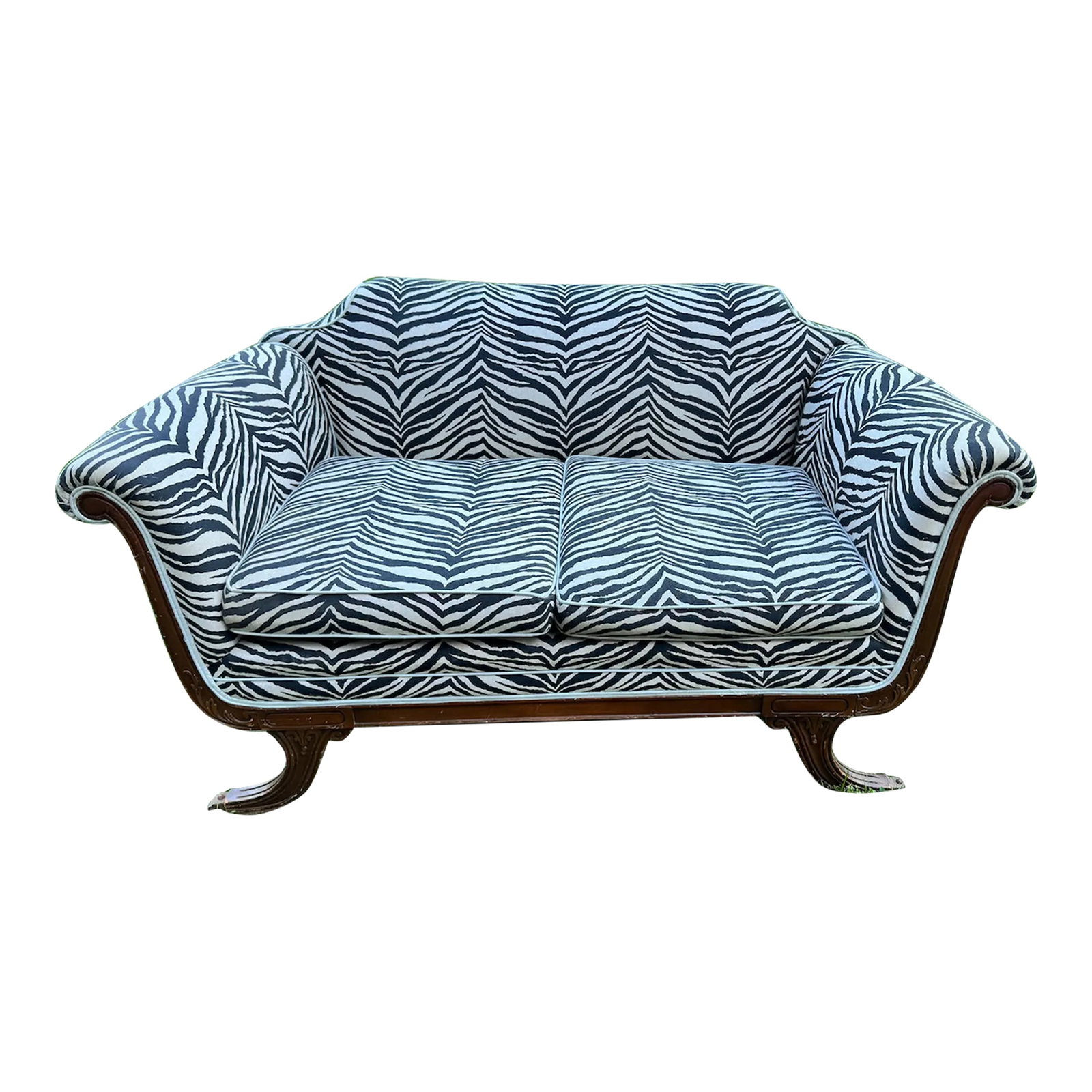 Antique Traditional Style Loveseat: Traditional style loveseat. Reupholstered in a cotton zebra black & off white print with a pale blue trim. Small tear in the back on the left side (see image). Cushions in great condition. Wood