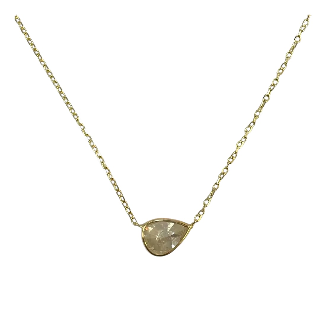 14k Yellow Gold 1.72ct Natural Diamond Bezeled Necklace: A unique showpiece, this 1.72ct mixed pear-cut natural diamond takes center stage, bezel-set in luxurious 14K yellow gold. Its adjustable chain offers versatility, making it an heirloom-worthy additio