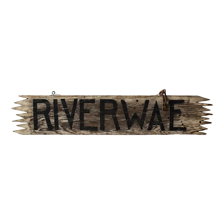 Antique Hand-Painted Wood "Riverwae" Sign, Circa 1920s: The "RIVERWAE" sign is single-sided with a cream ground and bold black lettering, both beautifully weathered by the elements. Circa 1920s. The ground shows the wood grain through the surface paint. Th