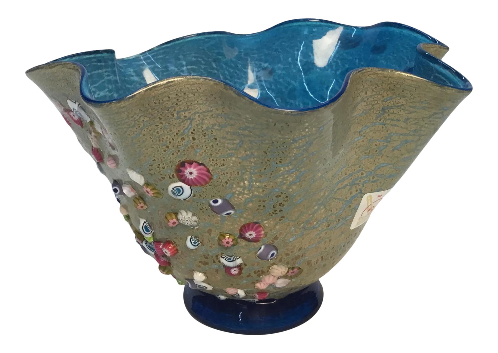 Late 20th Century Vetro Artistico Blue and Gold Morano Bowl With Raised Millefiori Elements: Beautiful and unusual Venetian glass bowl. Brilliant turquoise blue interior, gold specks and raised colorful millefiori beads on outside. Clear blue base. Vetro Artistico original label on side,