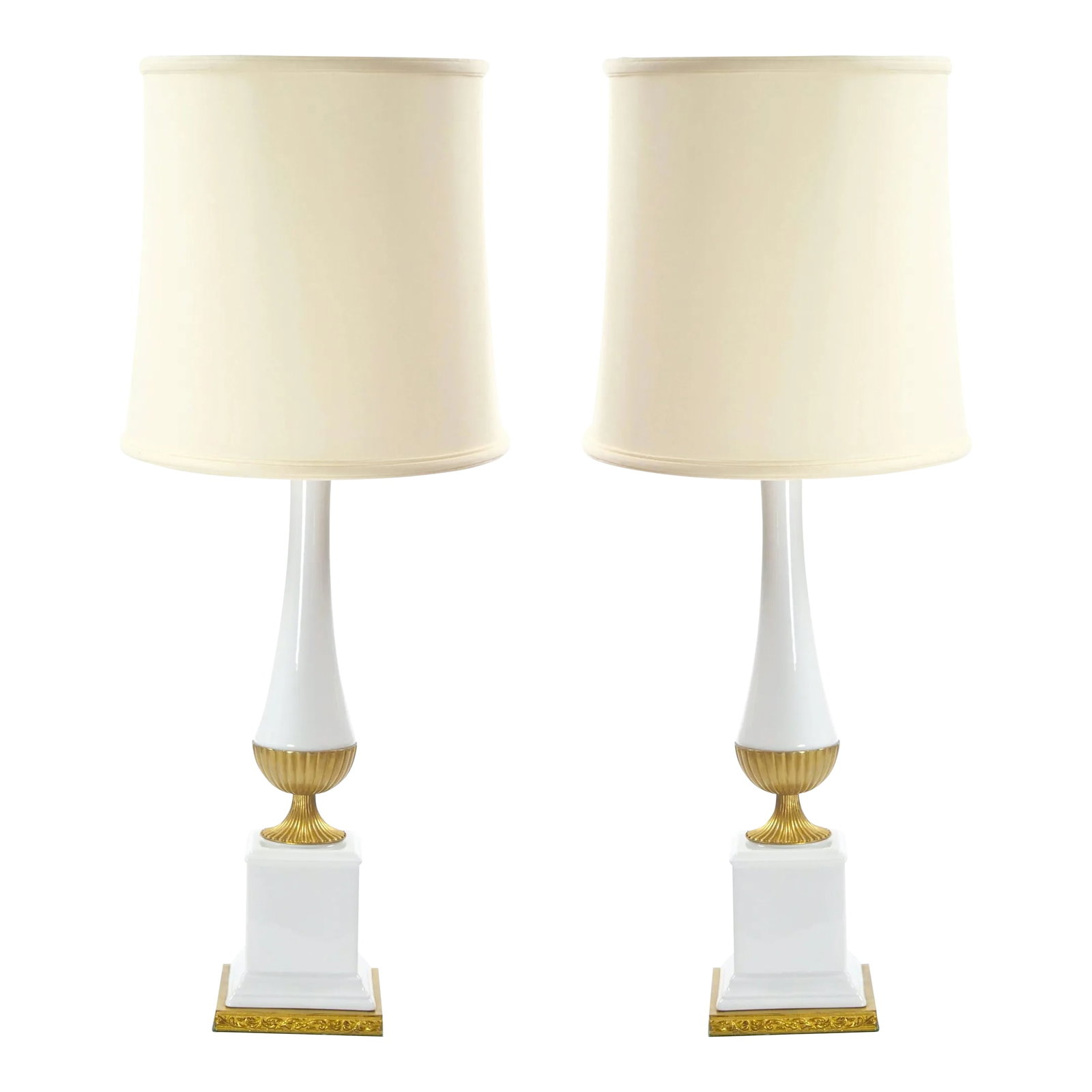 Mid-20th Century Italian Art Deco Porcelain Table Lamps/Gilt Brass Accents: These exceptional mid-20th century Italian table lamps are a captivating blend of architectural elegance and Art Deco refinement. Each lamp features a sleek, pole-shaped glass body adorned with intric