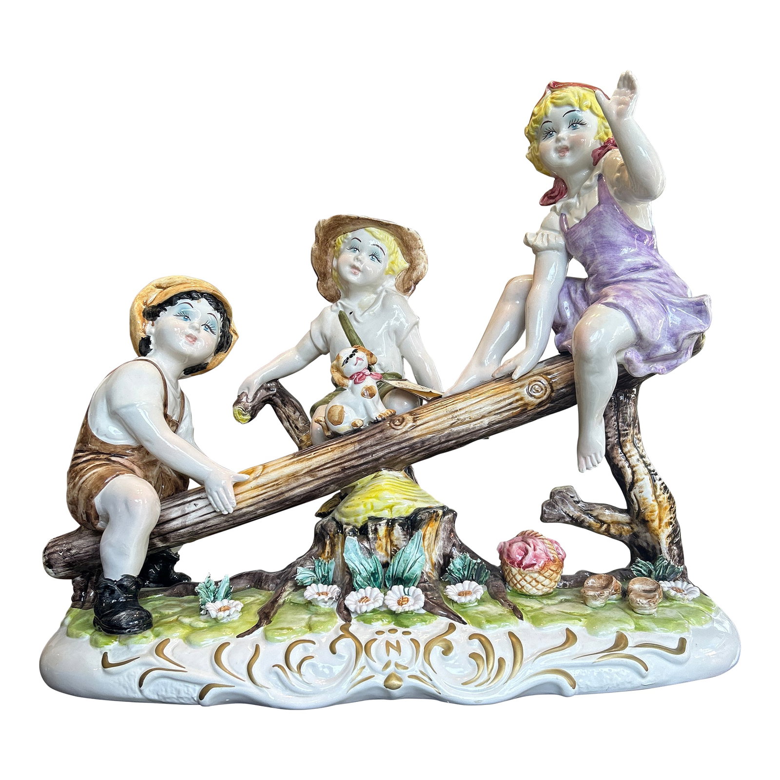 Large Capodimonte Porcelain Figural Sculpture of Children and Dog on Seesaw Mid to Late 20th Century: This is a large and very impressive vintage Italian Capodimonte porcelain figural group sculpture of three children and a dog playing on a see-saw. Date of production is unknown, but it was likely pro