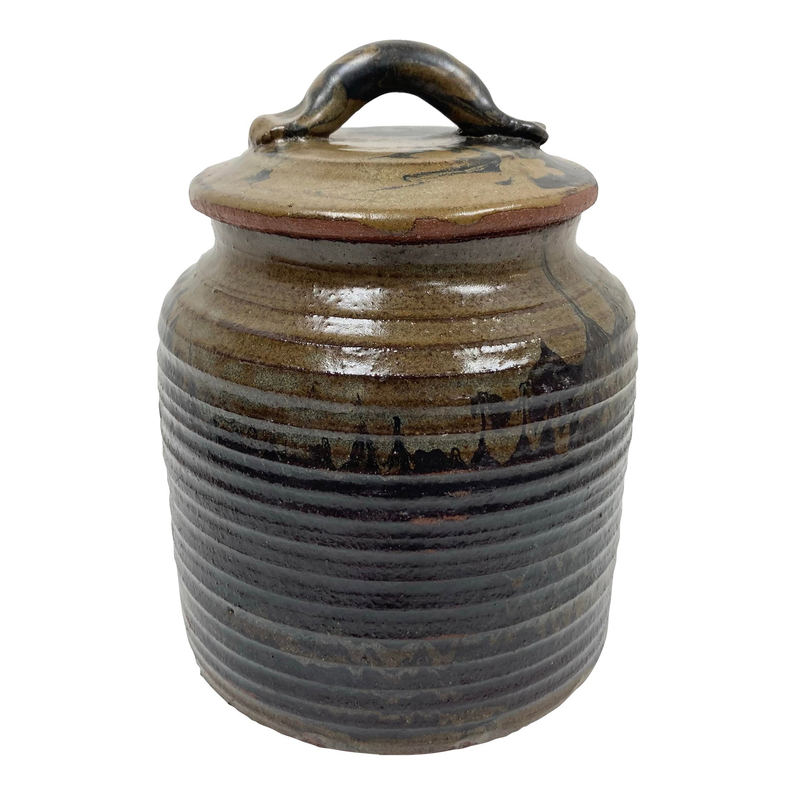 1970s Studio Pottery Vessel in Japanese Water Jar Form: A very well crafted lidded Water Jar in the form of the vessels used in the Japanese Tea Ceremony. The body of the jar is ribbed, glazed and bears fine abstract coloring in a deep deep brown on a