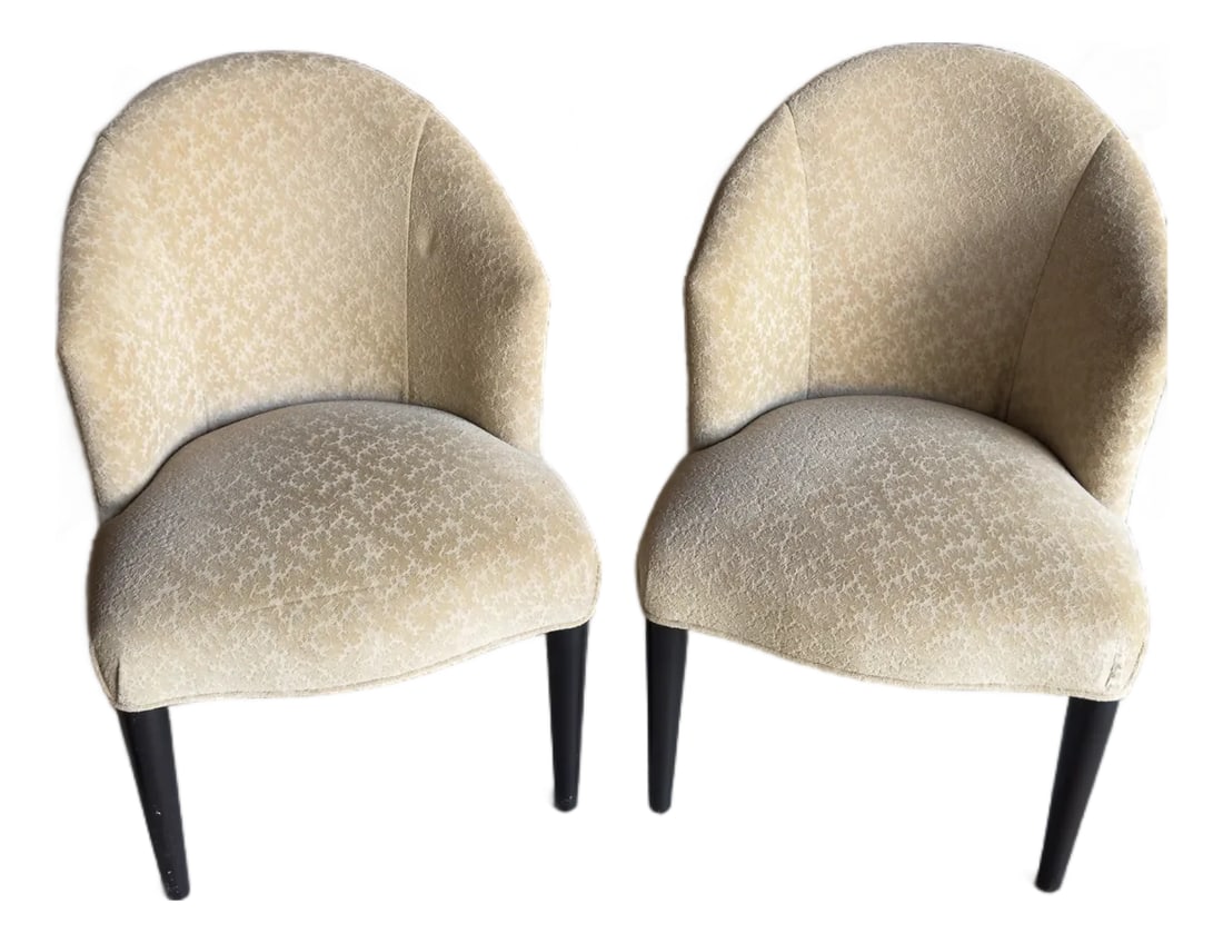 Pair of Donghia Shadow Arm Chairs Upholstered Fabric in Neutral Tan/Gold Subtle Leaf Pattern: Pair of Donghia Shadow Arm Chairs upholstered in jacquard leaf print in camel tan color. Add a touch of elegance to your home with this exquisite pair of Donghia upholstered chairs. These chairs