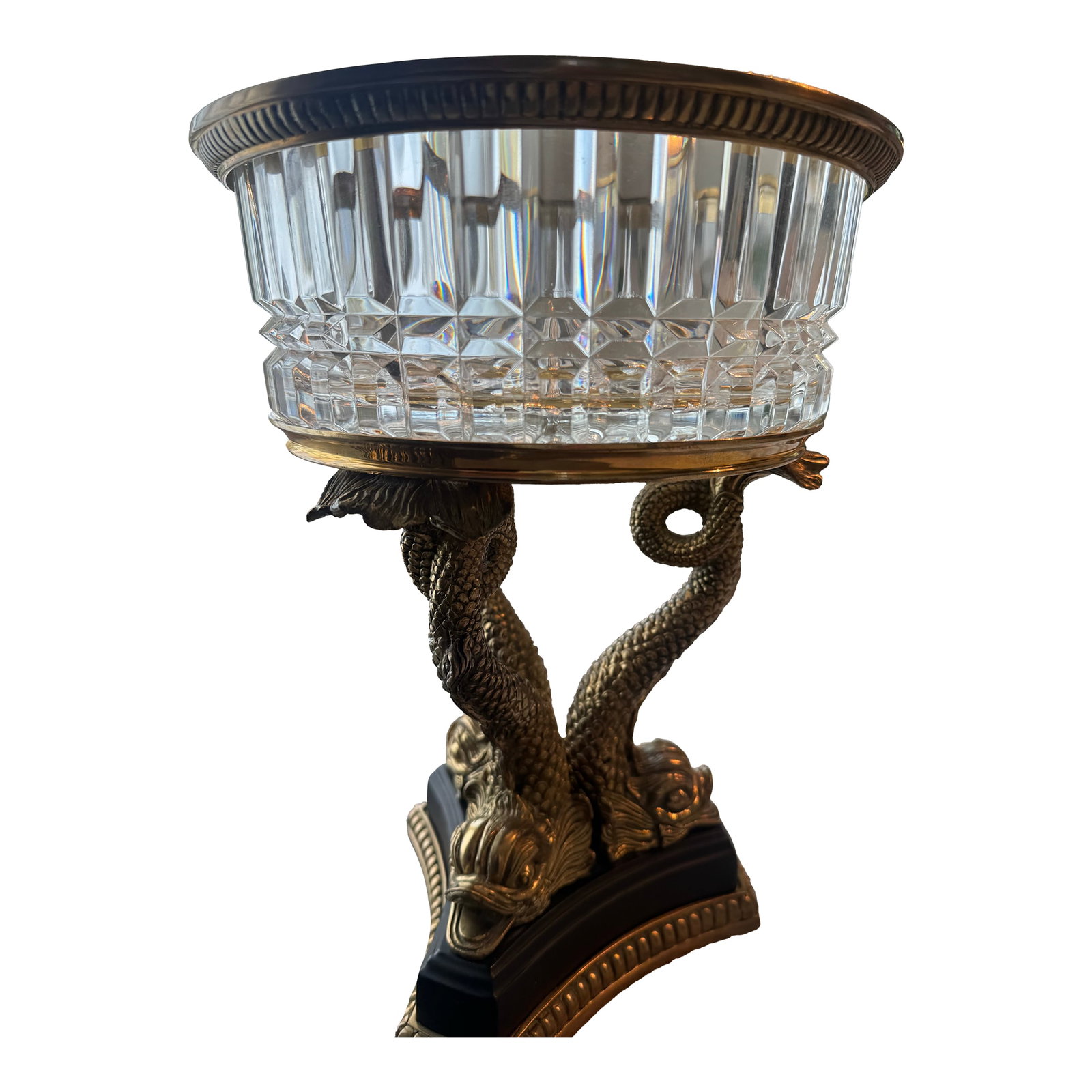 19th-Century French Empire Gilt Bronze & Cut Crystal Centerpiece Bowl - Twin Dolphin Base: A magnificent and rare 19th-century French Empire-style centerpiece, crafted from fine cut crystal and mounted on an elaborate gilt bronze dolphin base. The heavy crystal bowl features deep, faceted