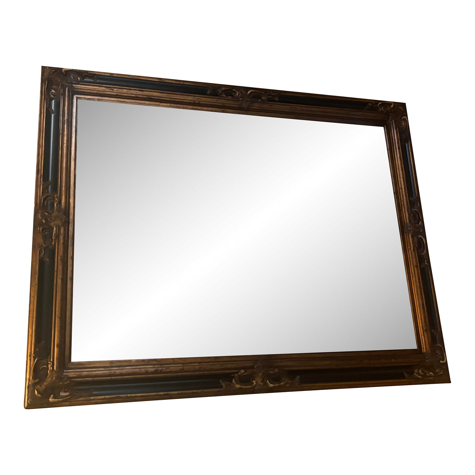 Large 1960s Baroque/Victorian Revival Frame Beveled Mirror: Exquisite ornate wall mirror with a gilded carved wood frame in a rich, antique gold finish. Intricate Baroque/Victorian-inspired detailing that instantly elevates any room. Large, statement piece ide