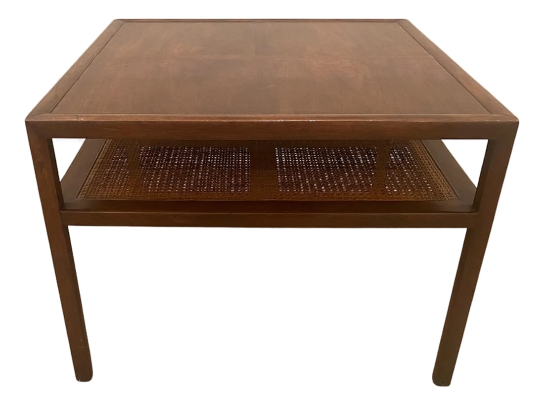 1990s Vintage Baker Co. Side Table With Two Tier Cane Shelf: Vintage Baker side table, walnut with cane square paneled lower shelf. This mid century Baker Furniture side table is in very good vintage condition with very little wear consistent with age . Simple 