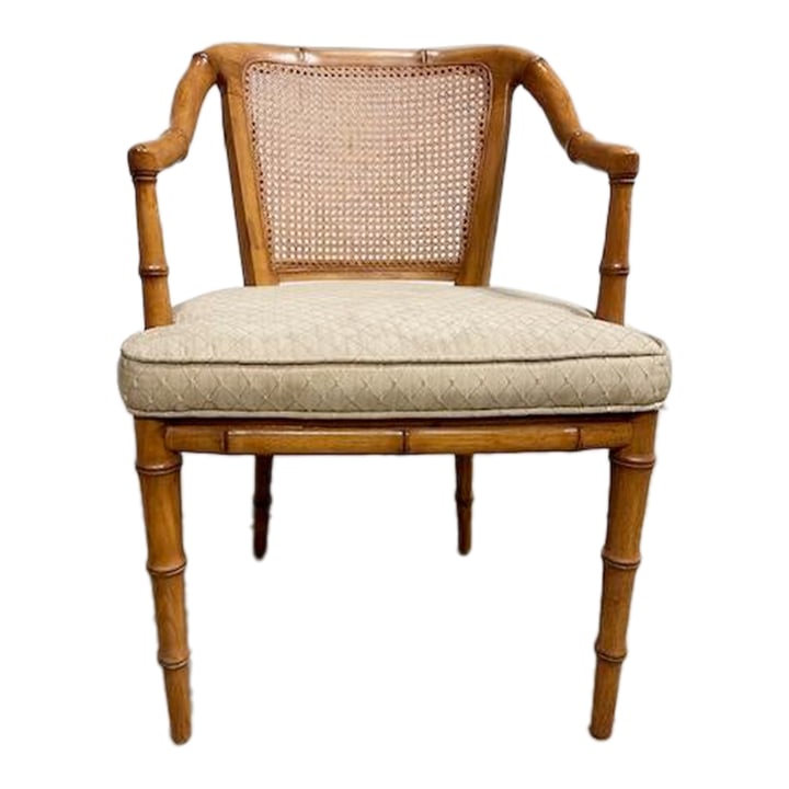 1980s Henredon Faux Bamboo Carved Wood Arm Chair: Henredon carved wood side or arm chair. The chair has a caned back and taupe jacquard cushion. Chair is stable and in good condition. Great as a side chair or an office chair. Condition: Alterations: 