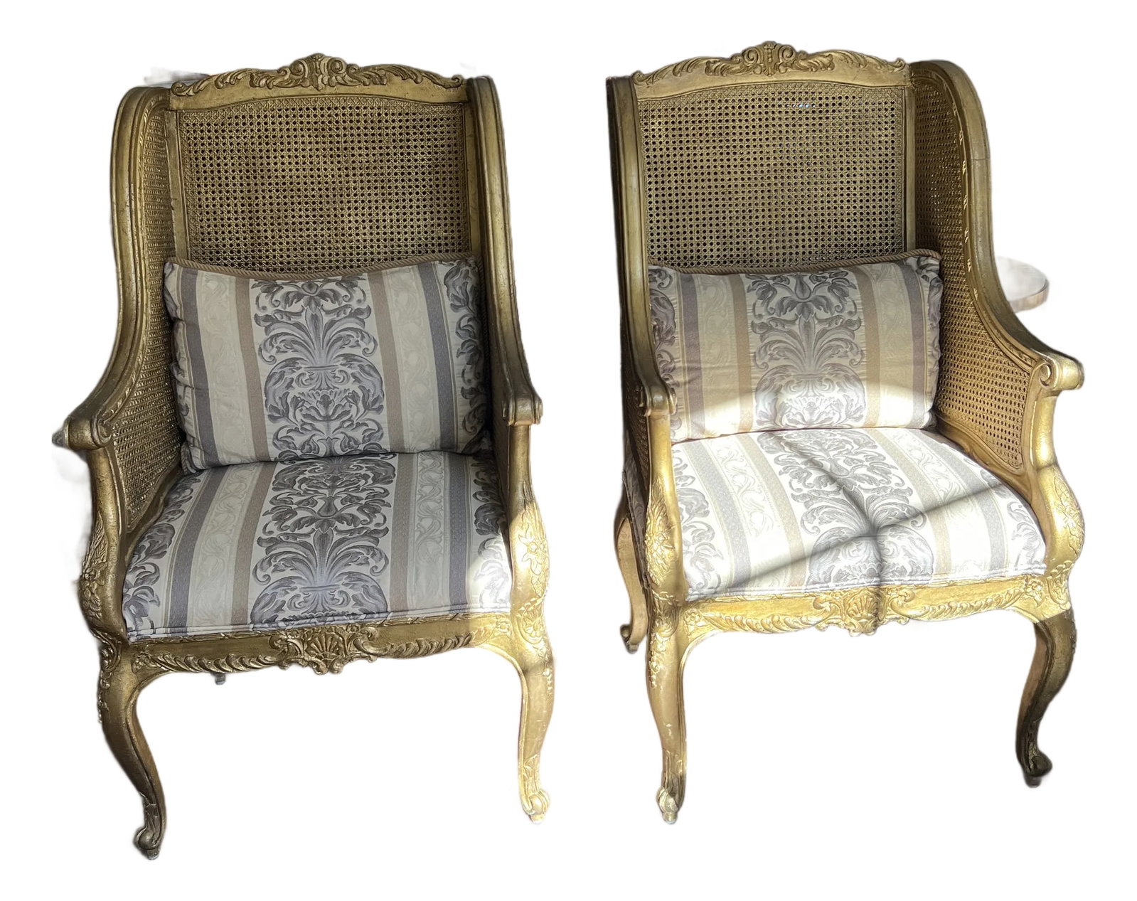 Mid 20th Century Henredon Schoonbeck Collection Gilt Cane Upholstered Bergeres: A rare exquisite oversize pair of Henredon Schoonbeck Collection Gilt Cane upholstered Bergeres in good vintage condition. Item is marked with Henredon Schoonbeck label. Comes with the two pillows.