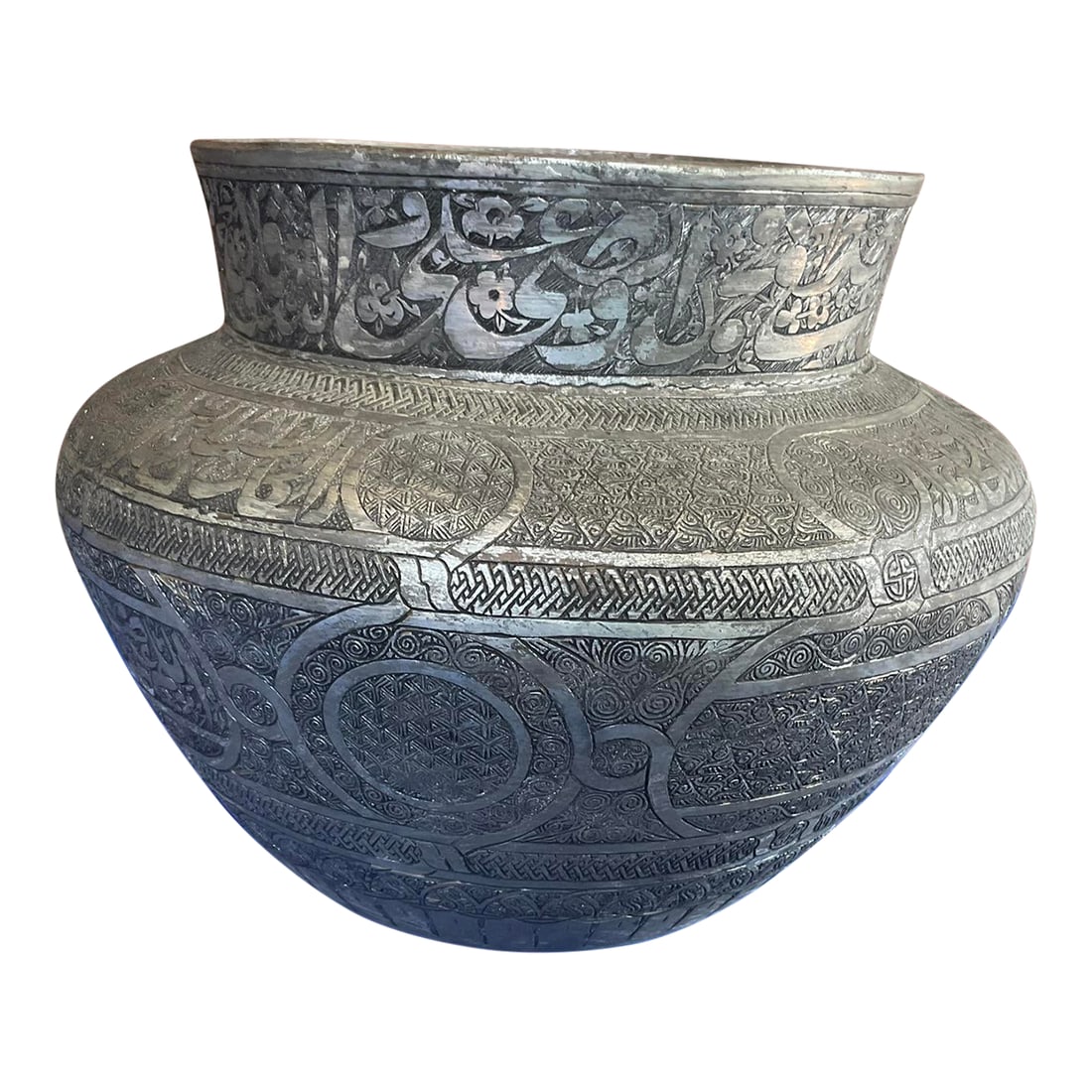 Antique Persian Safavid Carved Tin Over Copper Bowl: Antique Persian Safavid Carved Tin Over Copper Bowl in good estate condition. It has a beautiful etched design. There are some worn areas where the copper is showing. Measures 8 3/8" high and 9 1/2"