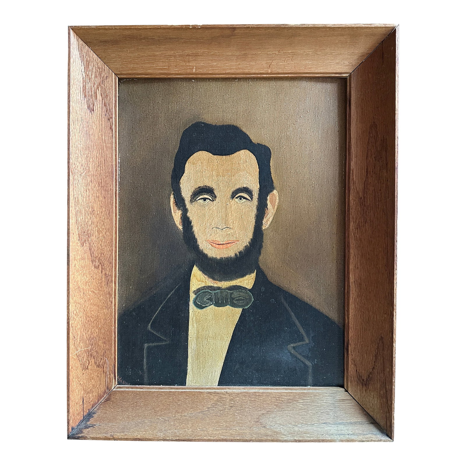 Circa 1940 American Folk Revival Portrait of Abraham Lincoln, Oil on Canvas Board: Mid-20th-century American folk revival portrait of Abraham Lincoln, hand-painted in oil on canvas board in a naive, self-taught style. The work depicts Lincoln in a classic bust-length composition