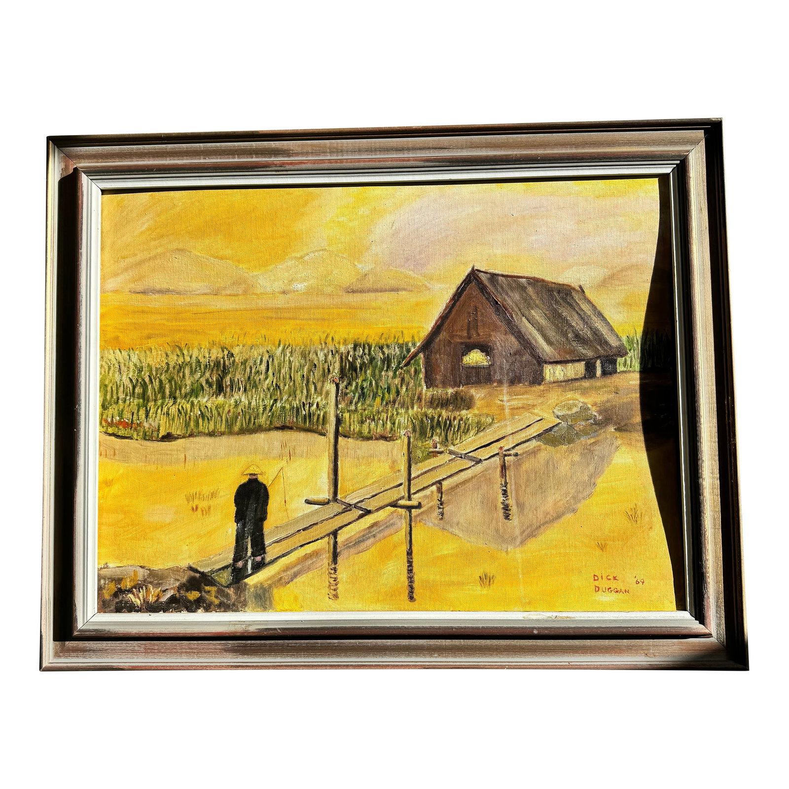 1969 Dick Duggan California Plein Air Landscape Painting, Mid-Century Rustic Modern: Original mid-century American landscape painting by Dick Duggan, dated 1969, depicting a rural agricultural scene with a wooden barn, marshland, and a solitary figure crossing a narrow footbridge. Exe